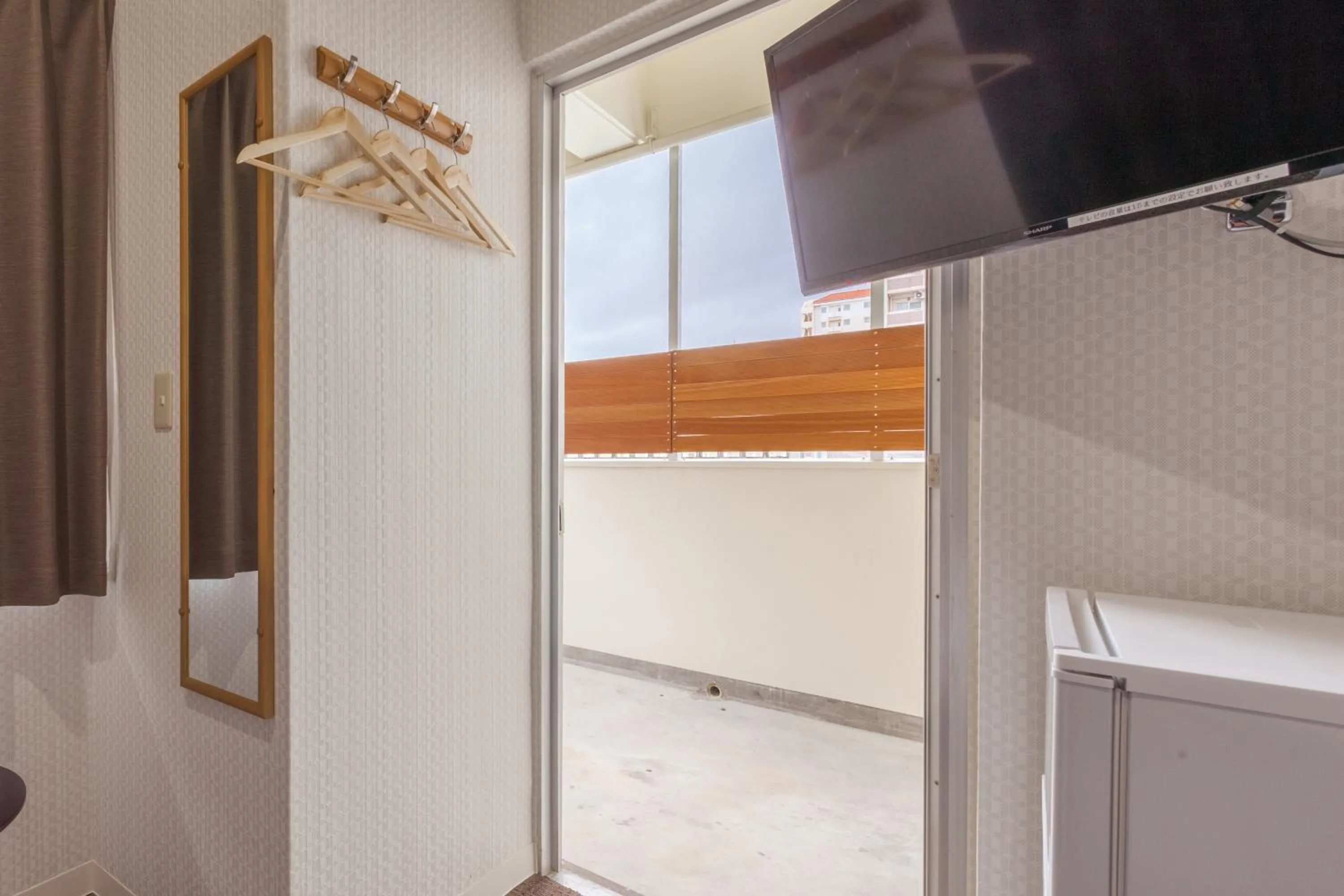 Photo of the whole room in HOTEL THE CUBE Naha Kokusai Street