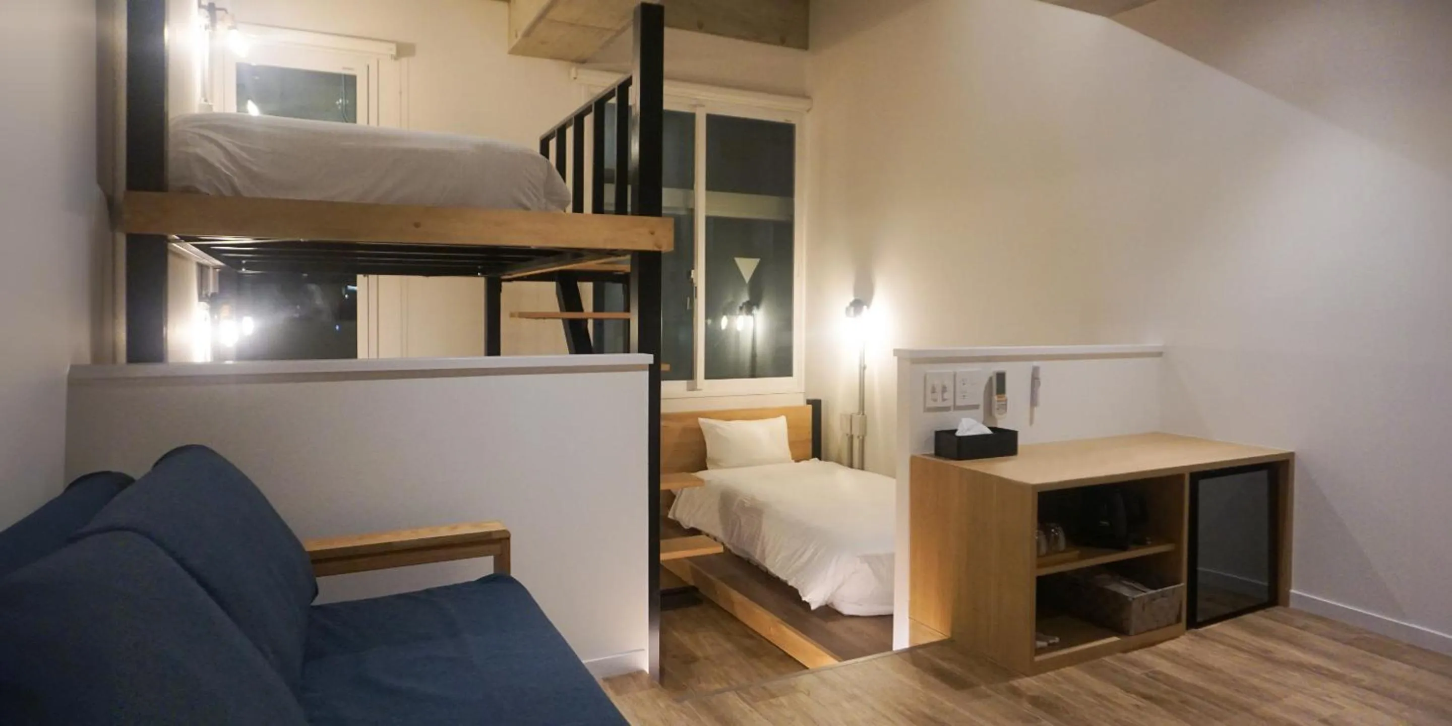 Photo of the whole room, Bed in HOTEL THE CUBE Naha Kokusai Street