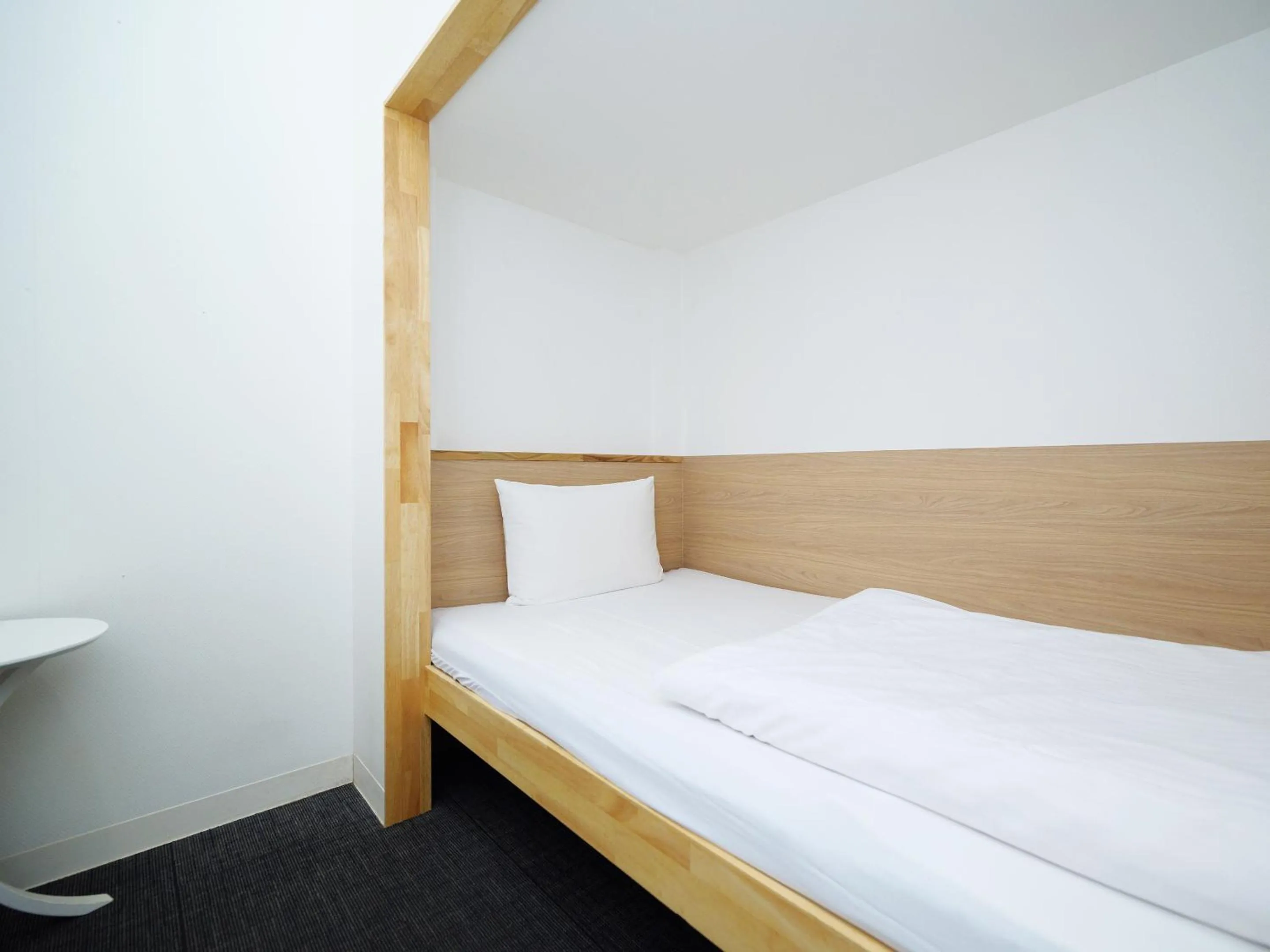 Bed in HOTEL THE CUBE Naha Kokusai Street