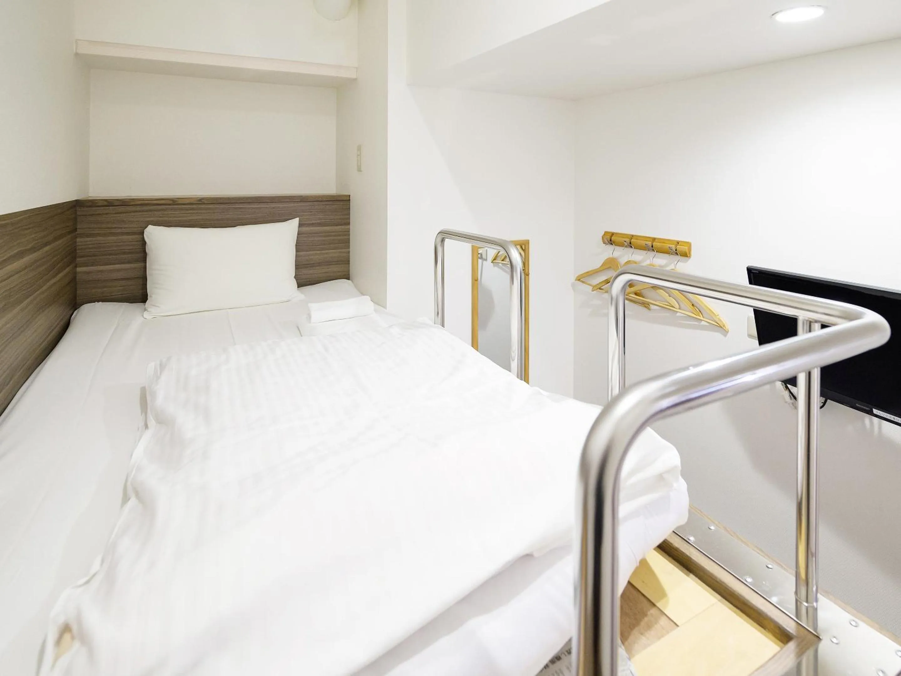 Bed in HOTEL THE CUBE Naha Kokusai Street