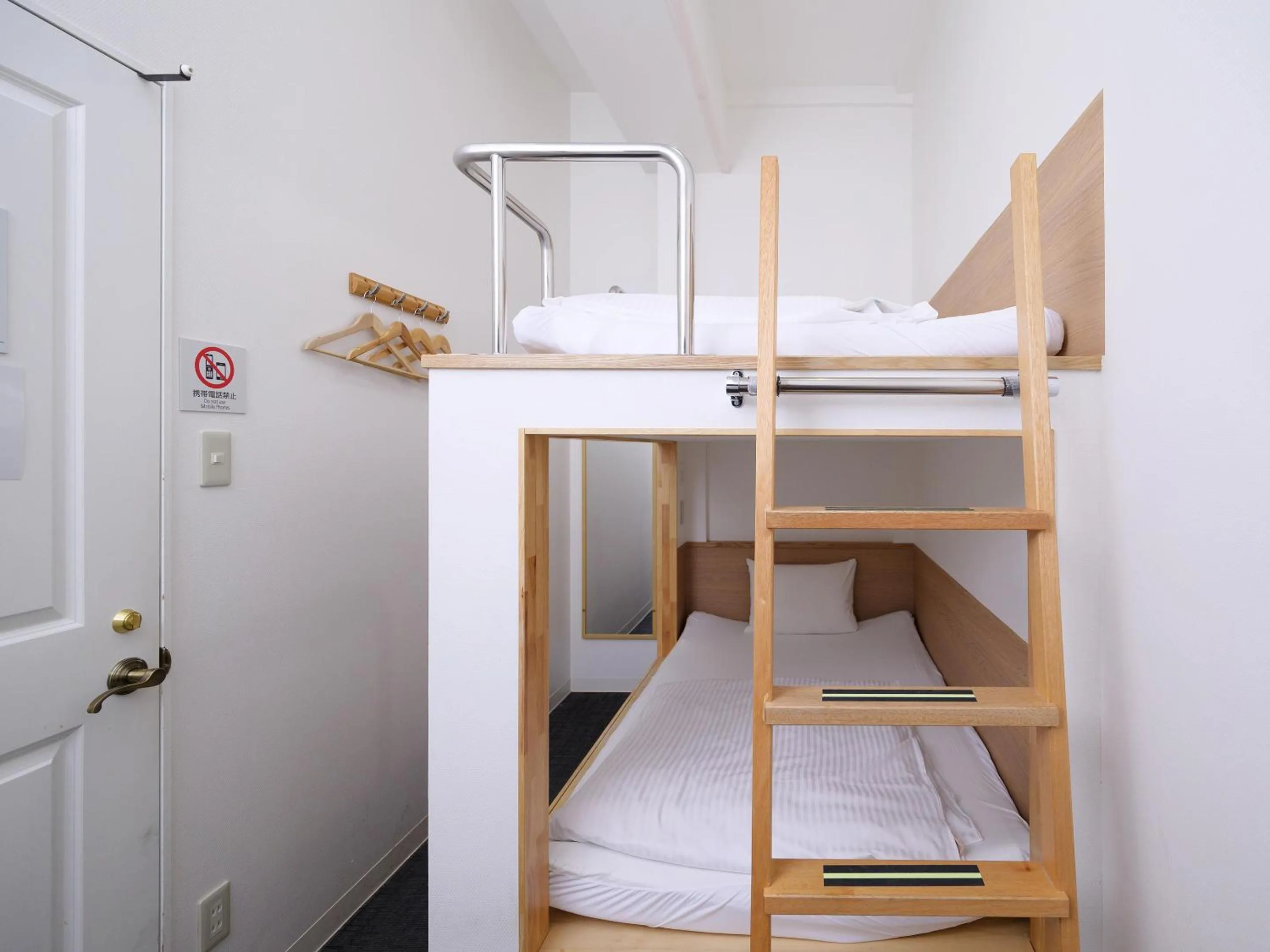 Photo of the whole room, Bed in HOTEL THE CUBE Naha Kokusai Street