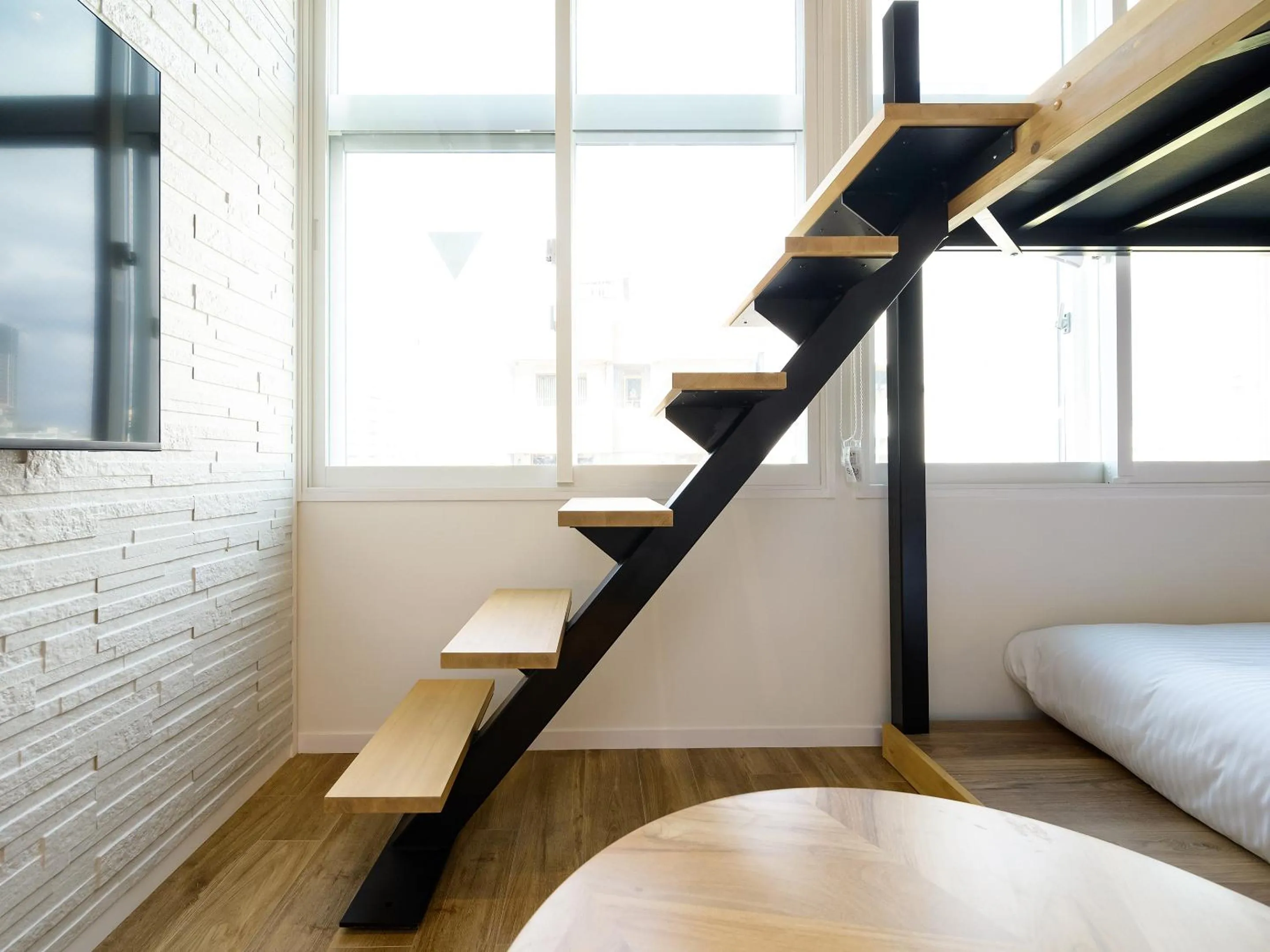 Photo of the whole room, Bed in HOTEL THE CUBE Naha Kokusai Street