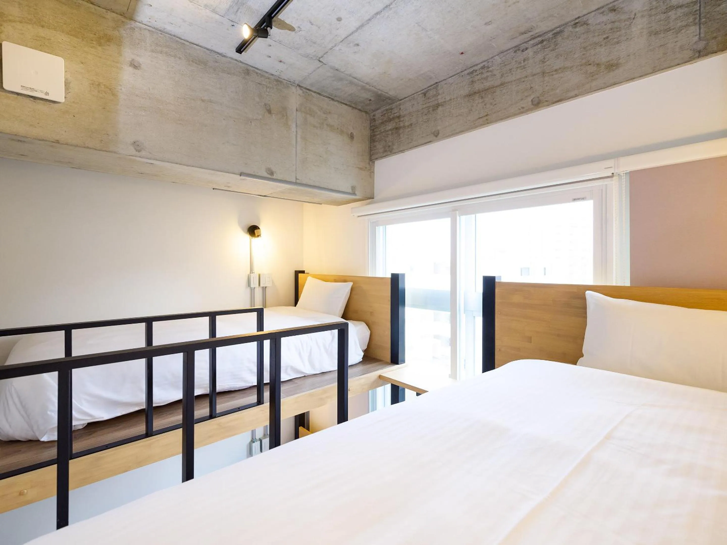 Bed in HOTEL THE CUBE Naha Kokusai Street