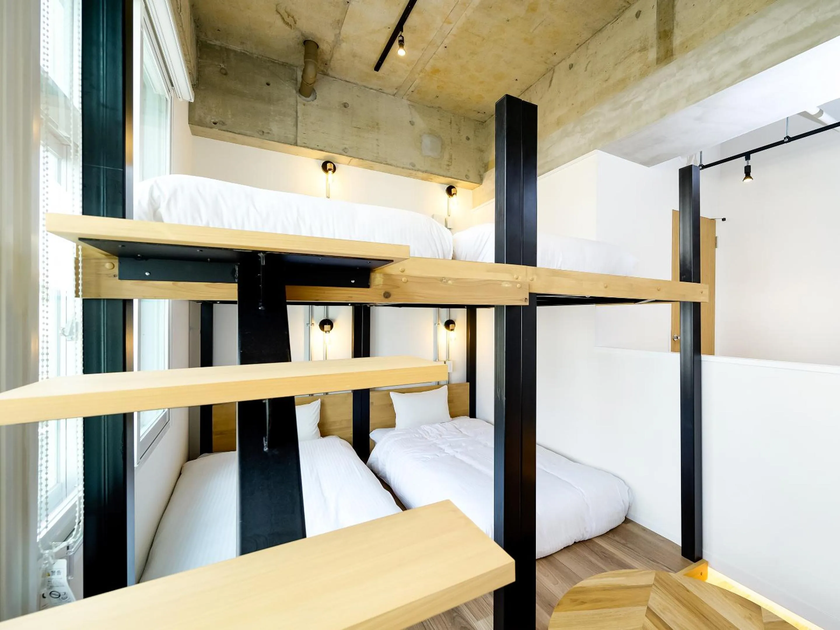 Photo of the whole room, Bed in HOTEL THE CUBE Naha Kokusai Street