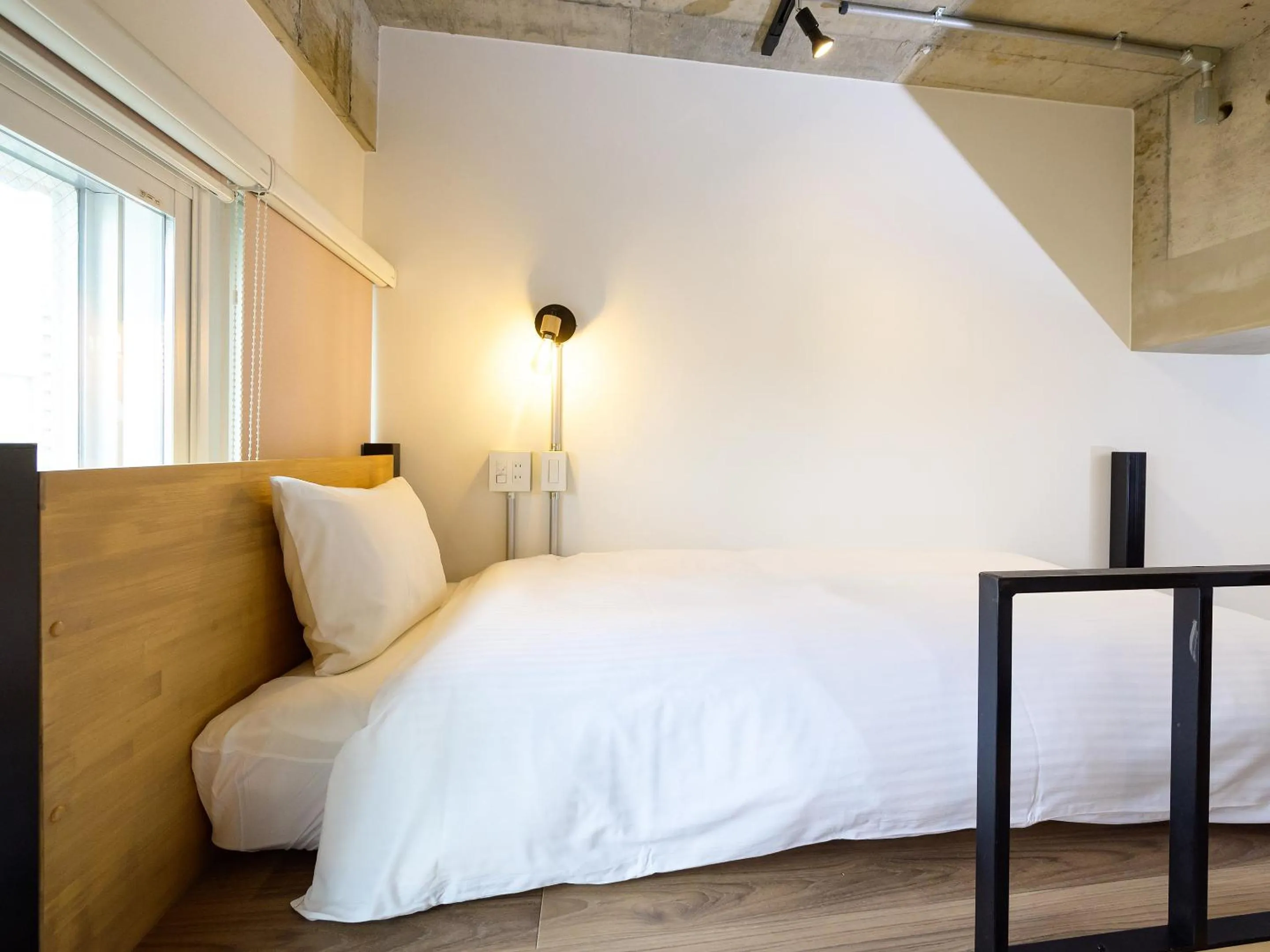 Bed in HOTEL THE CUBE Naha Kokusai Street