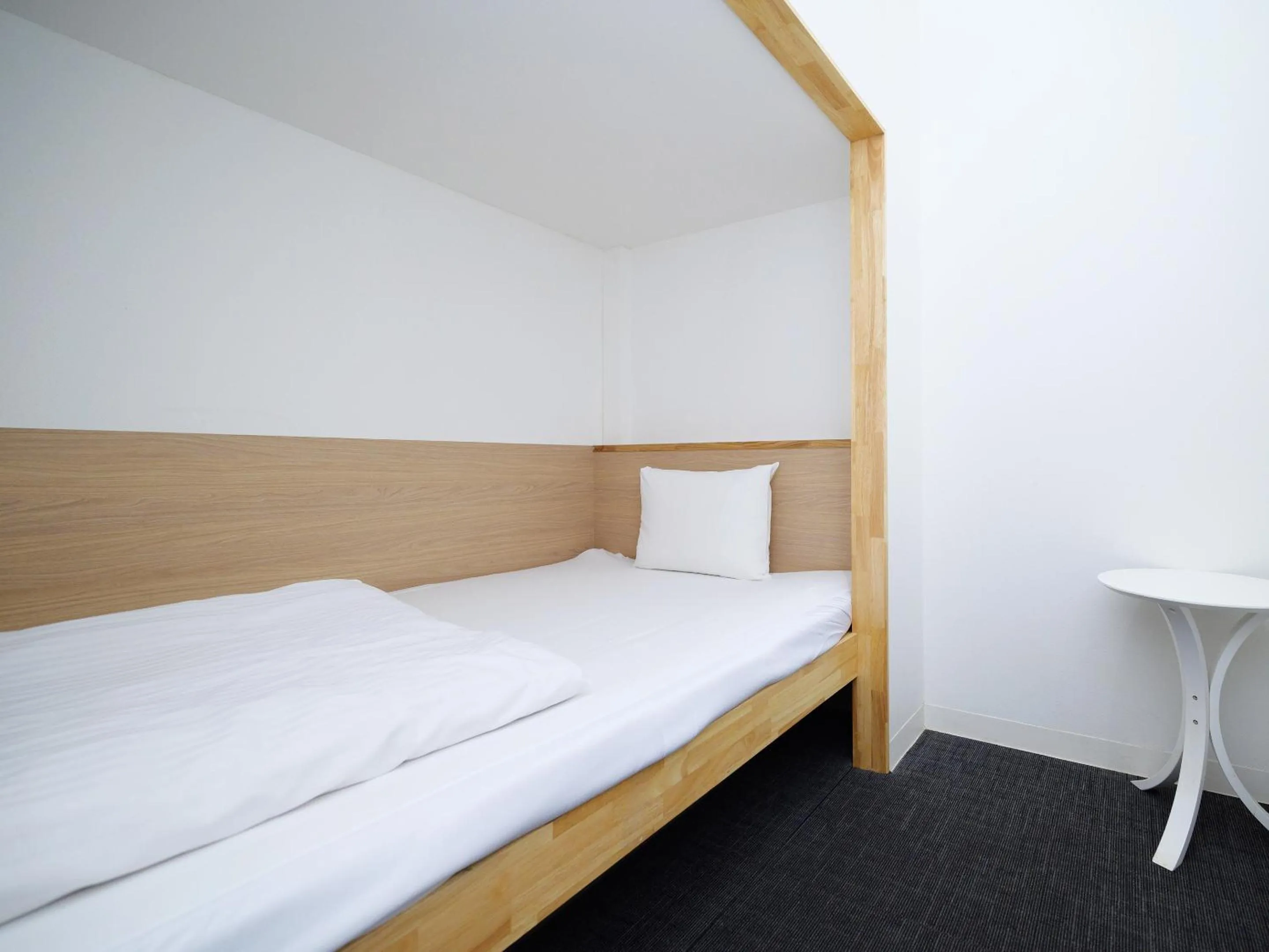 Bed in HOTEL THE CUBE Naha Kokusai Street