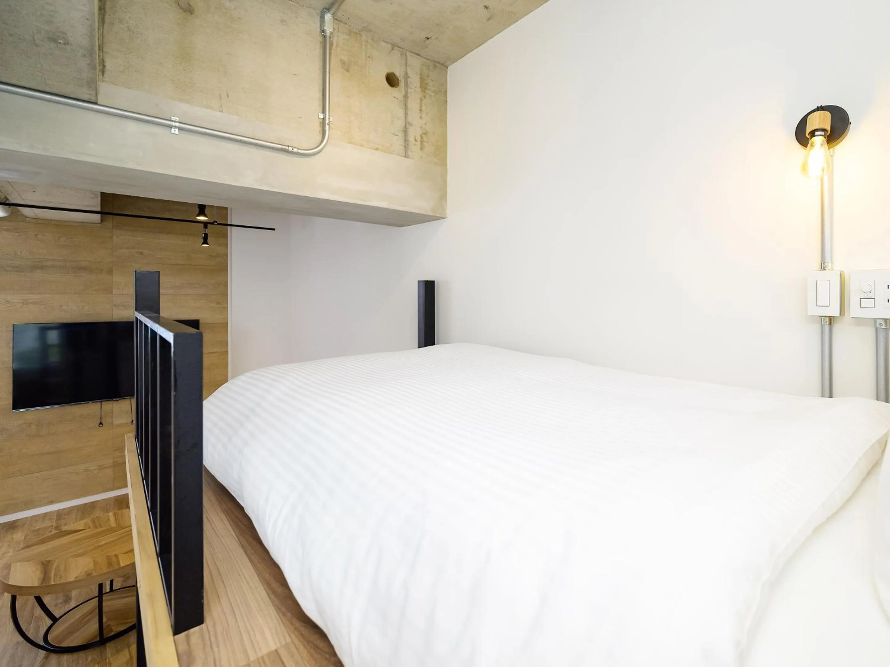 Bed in HOTEL THE CUBE Naha Kokusai Street