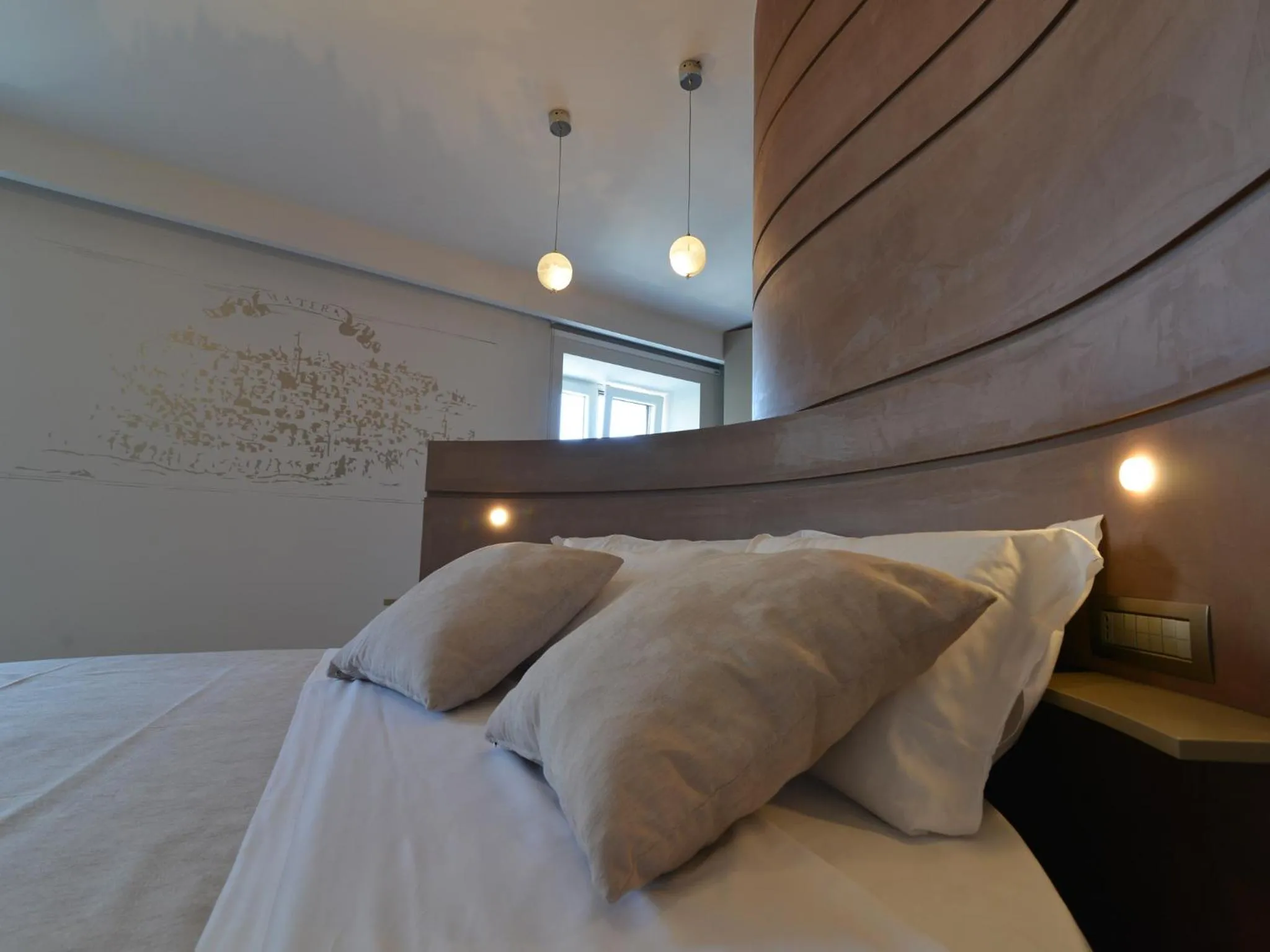 Bed in La Residenza del Monaco bianco