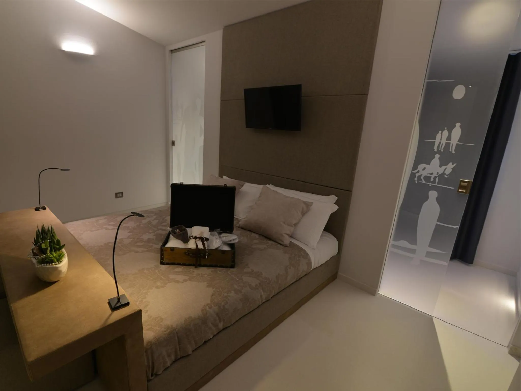 Bed in La Residenza del Monaco bianco