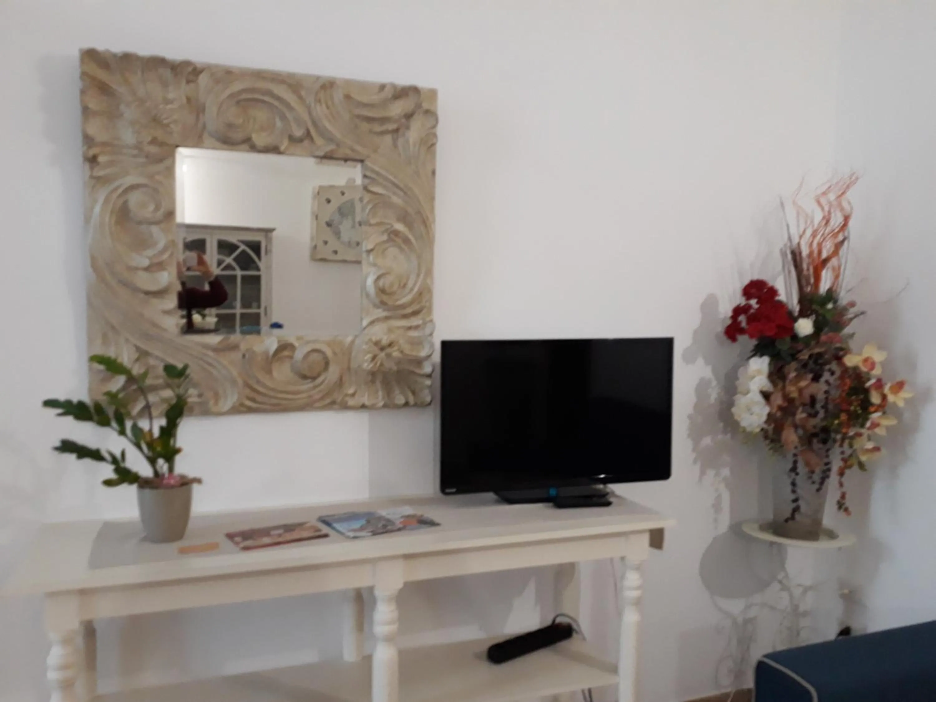 Communal lounge/ TV room in Affittacamere da Arianna