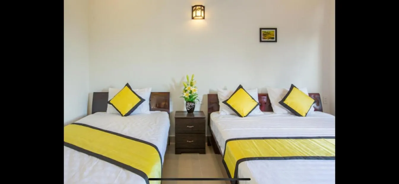 Photo of the whole room, Bed in Quynh Chau Homestay Hội An