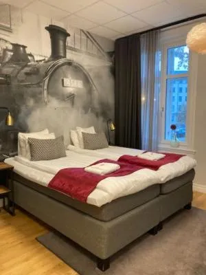 Bed in Livin Station Hotel
