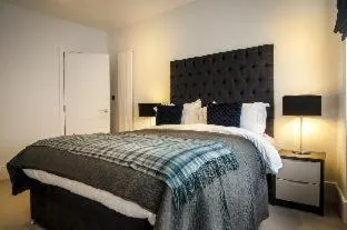 Bed in Garrick Mansions by Aeria Apartments