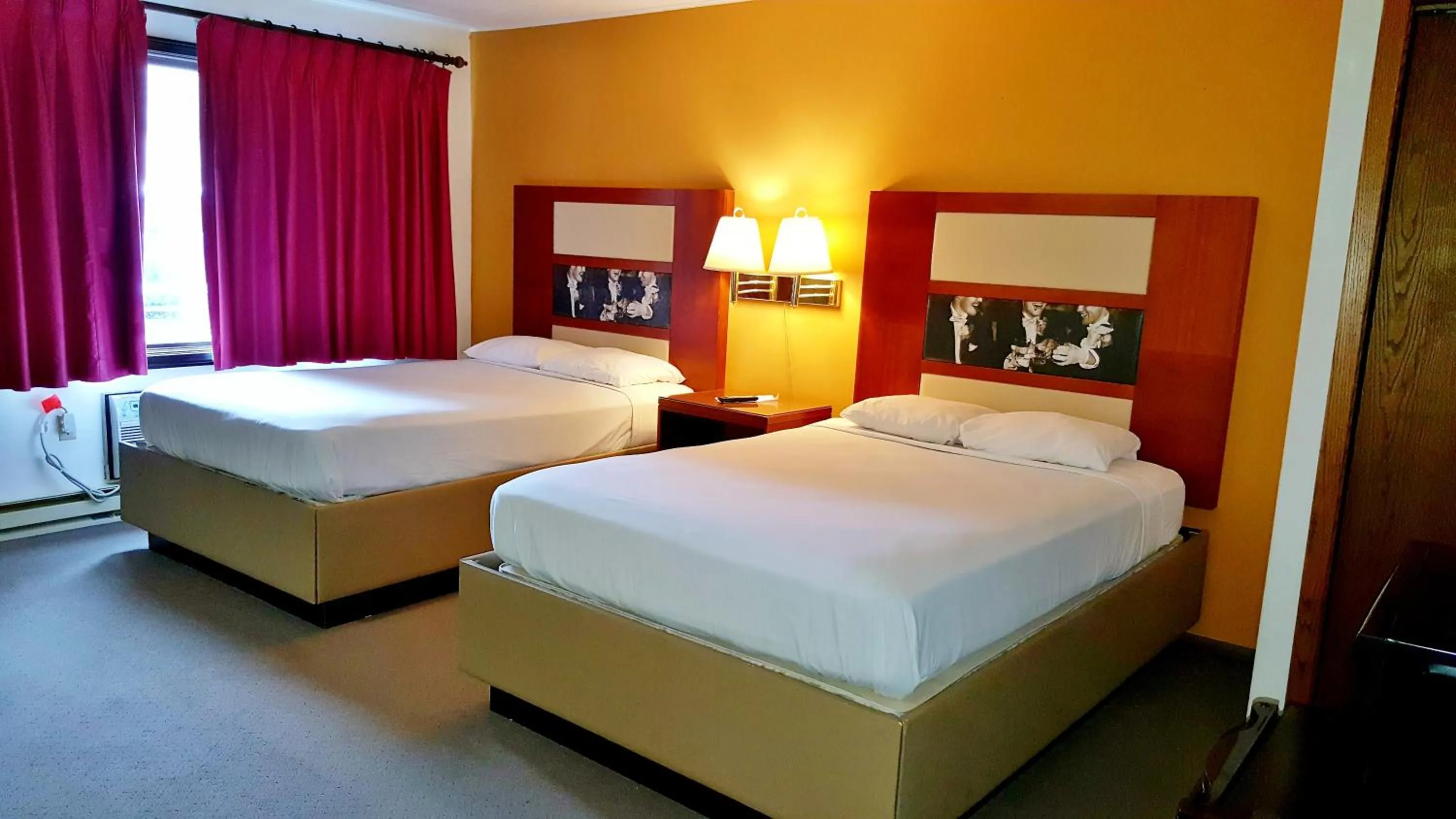 Room Photo in Country Hearth Inn-Iron Mountain