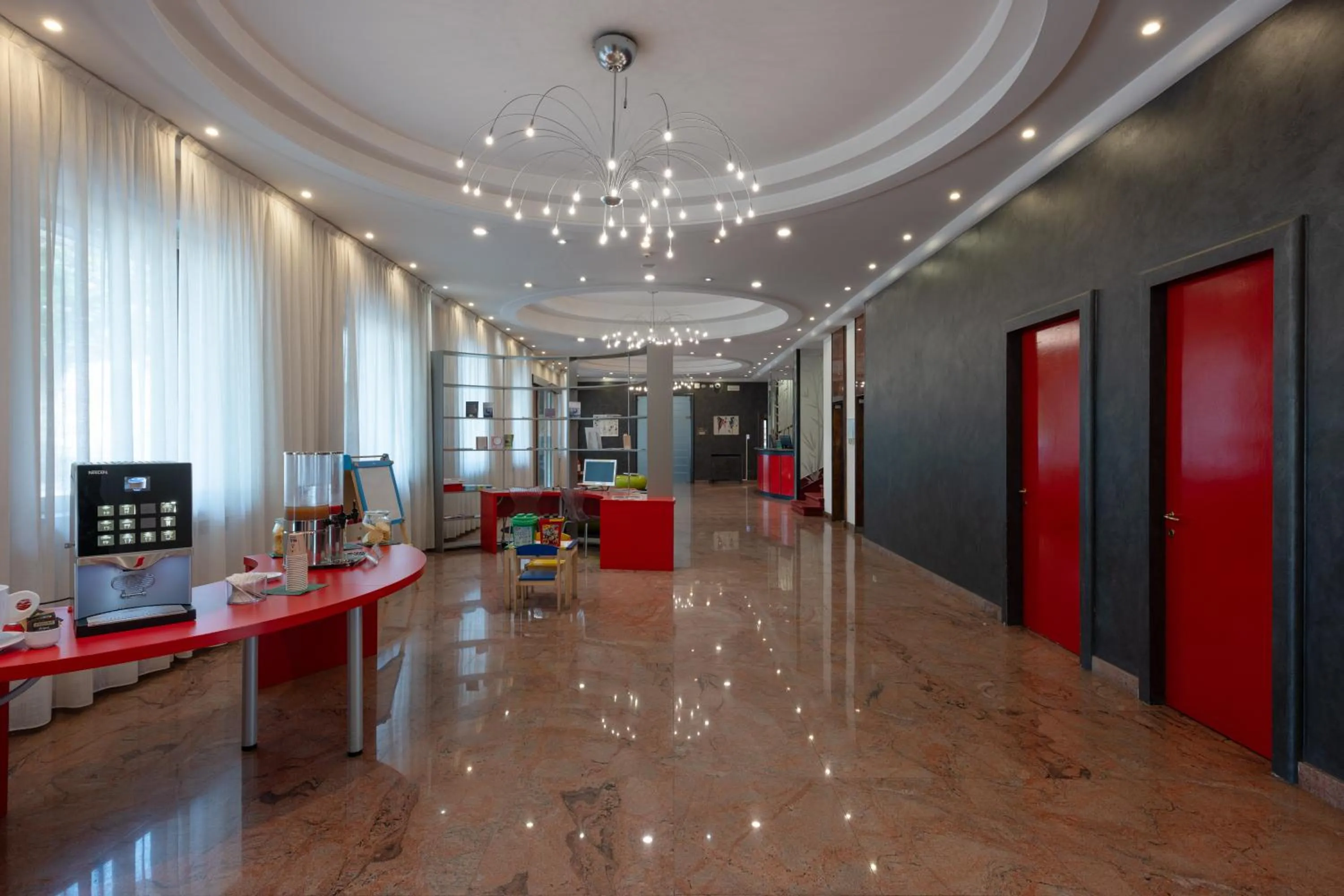 Lobby or reception in Hotel Toscanini