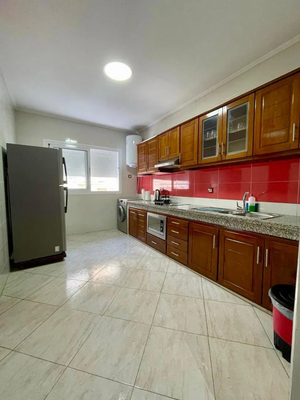 Kitchen or kitchenette in Appart Hotel Rania