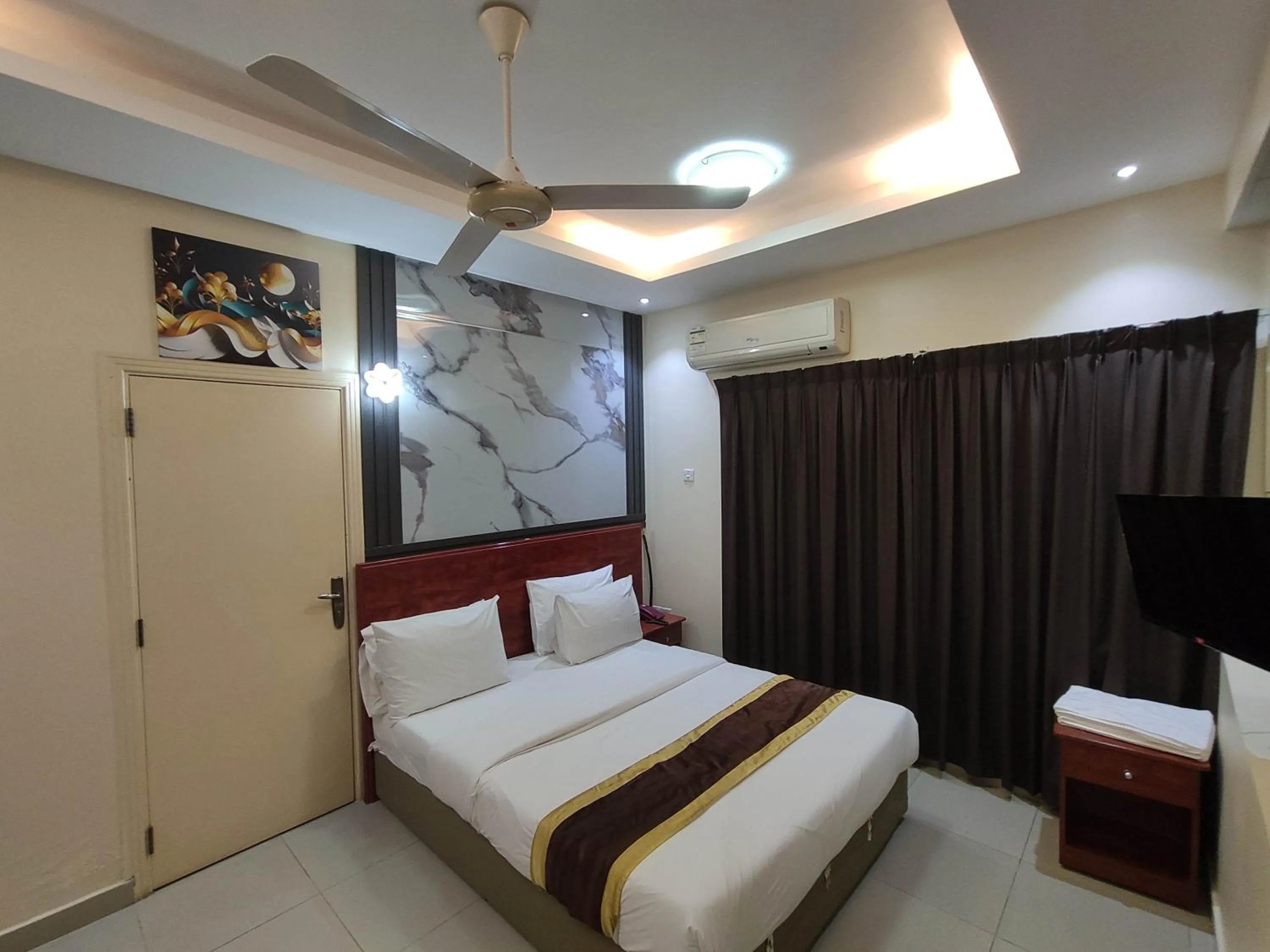 Bed in Al Nakheel Hotel Apartments