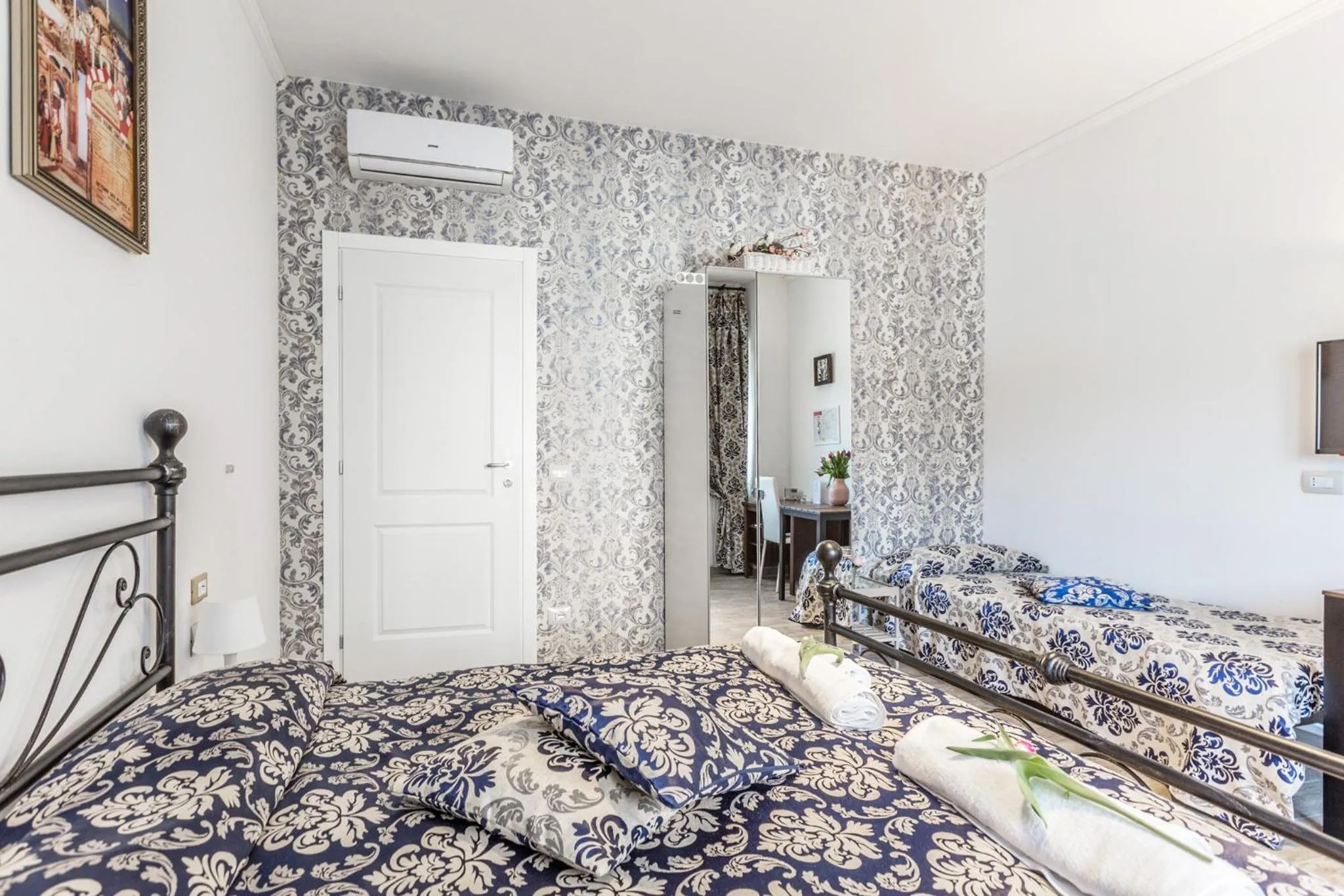 Bed in Central City Rooms