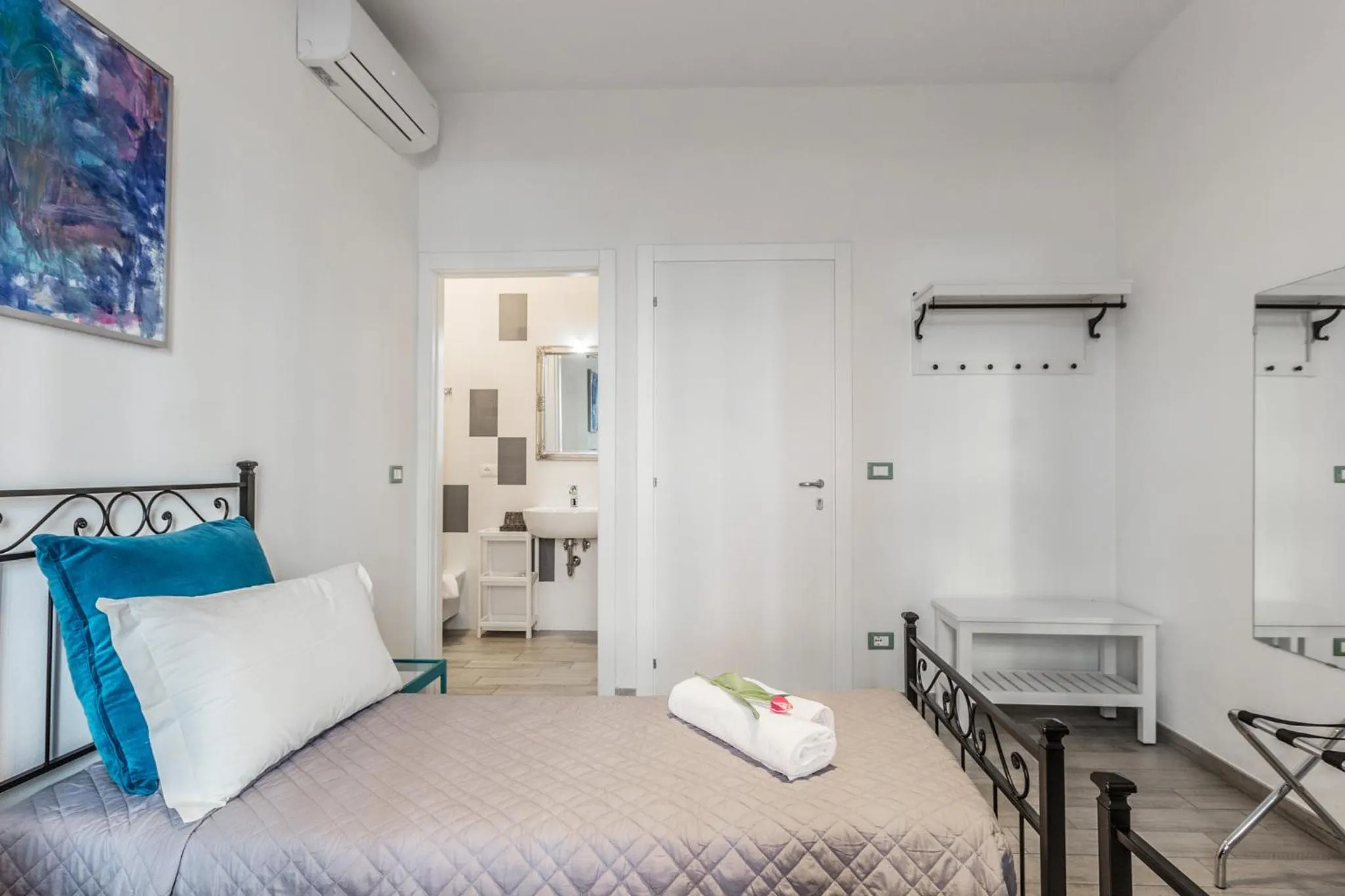 Bed in Central City Rooms