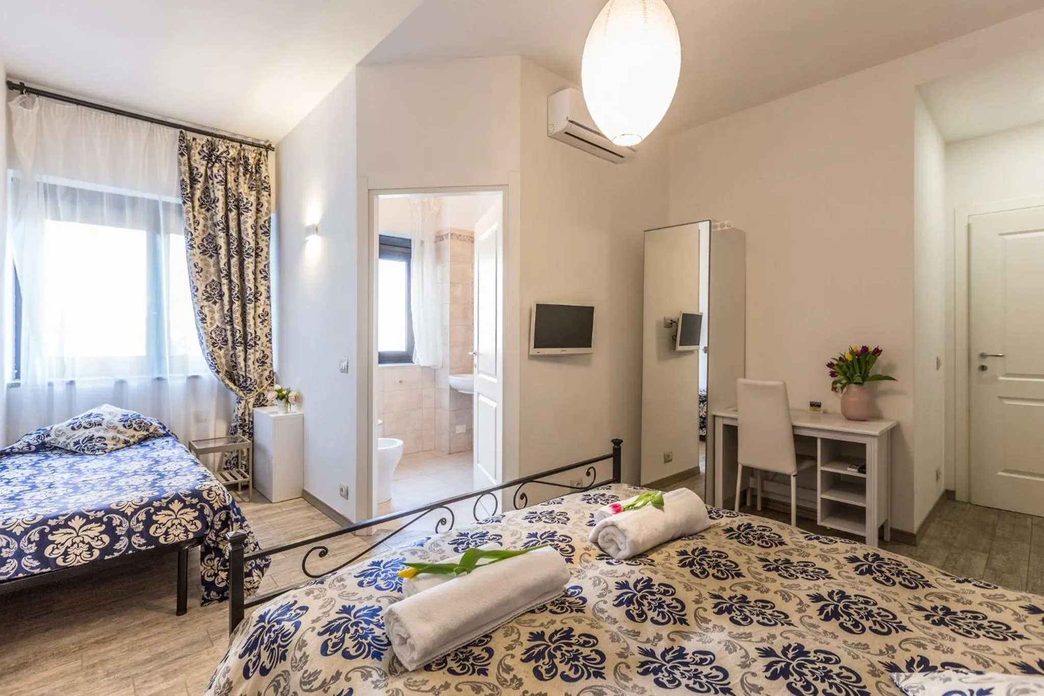 Bed in Central City Rooms