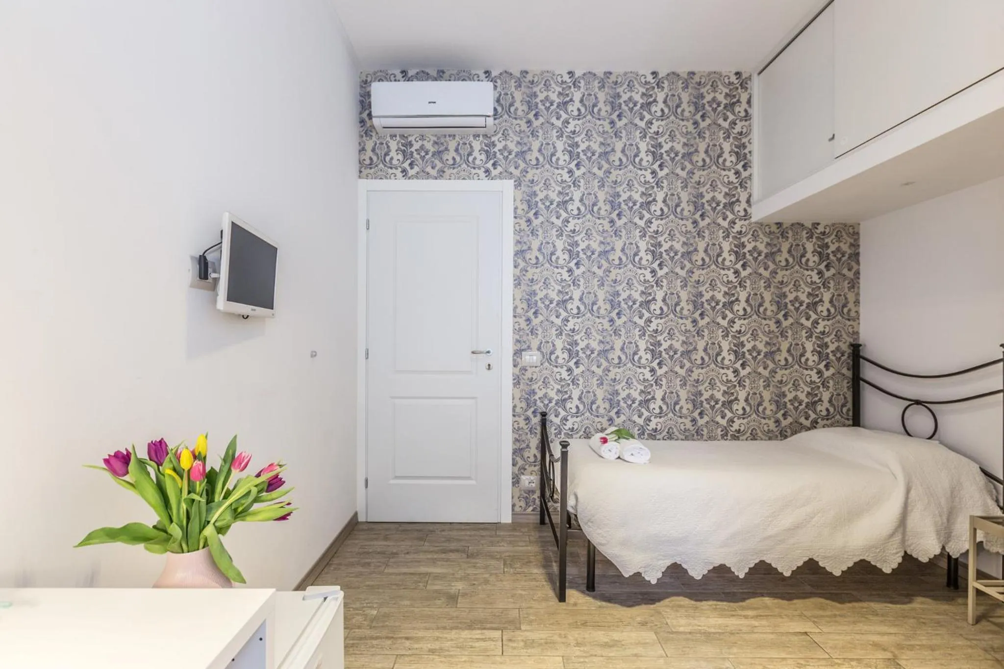 Bed in Central City Rooms