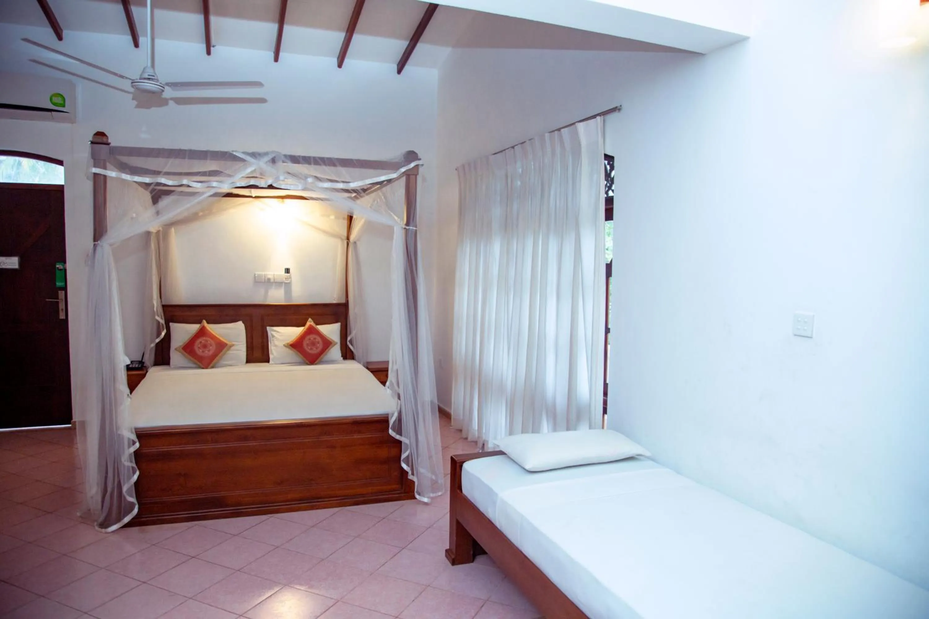 Bedroom, Bed in Prince Beach Hotel Bentota