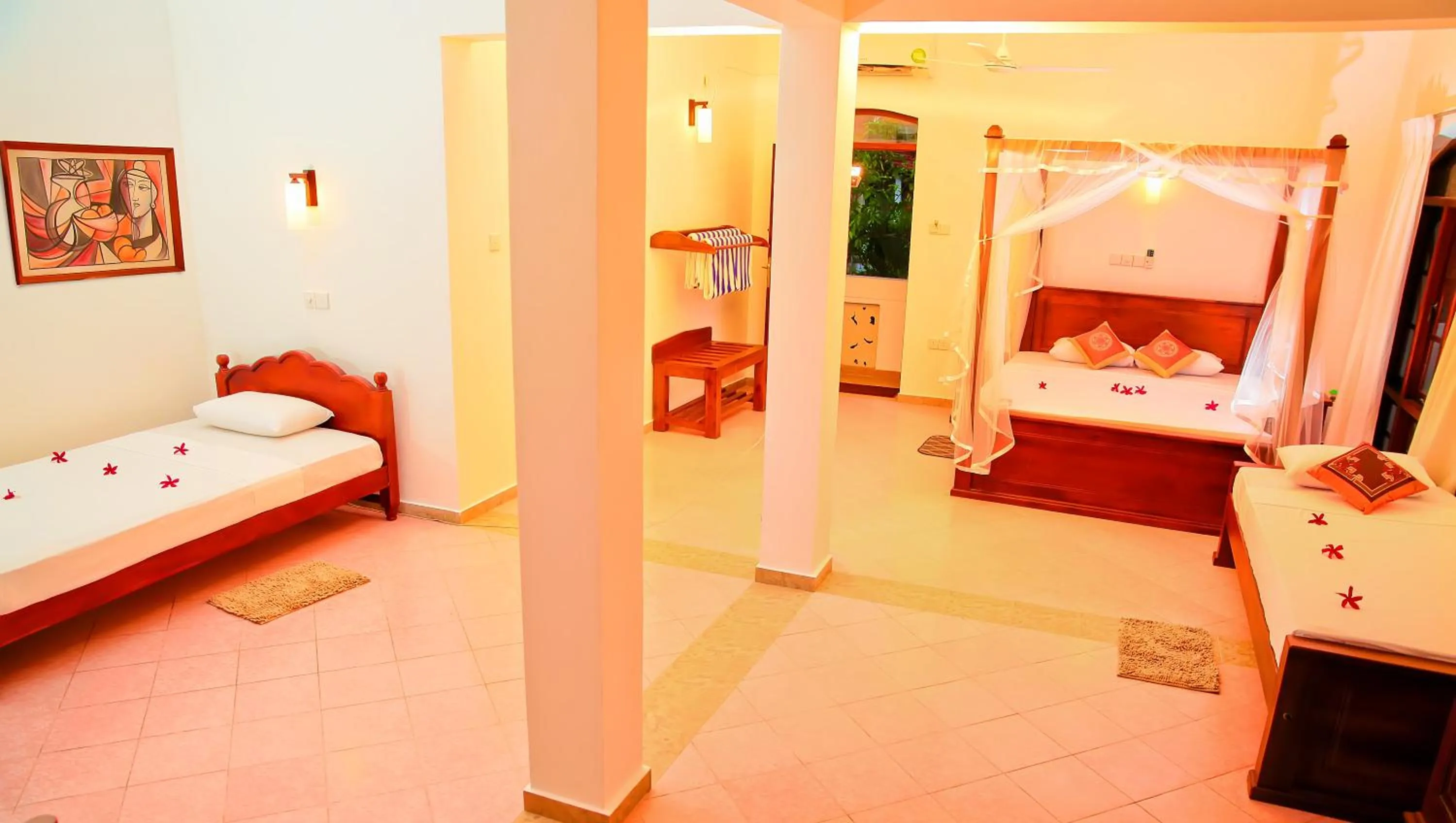 Bed in Prince Beach Hotel Bentota