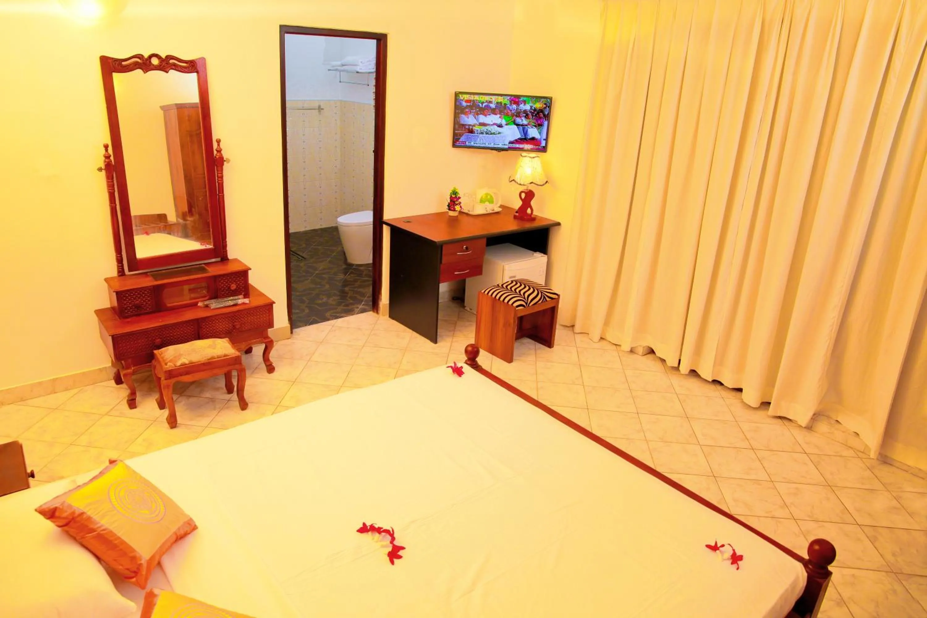 Bed in Prince Beach Hotel Bentota