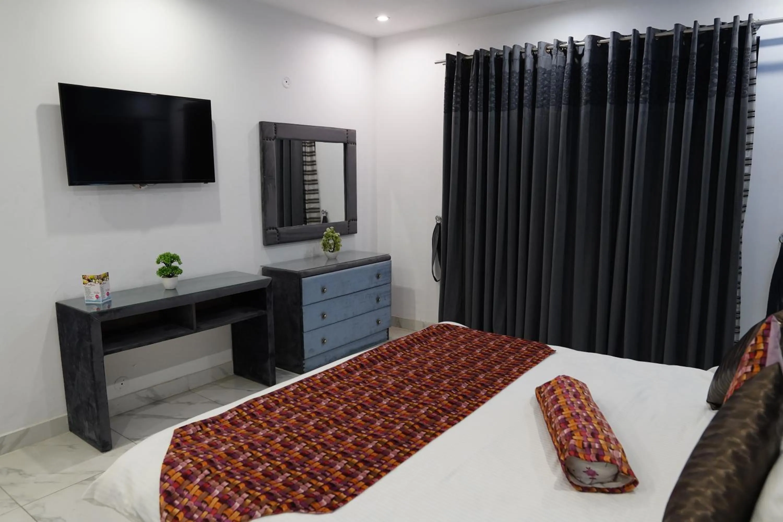 Bed in Grand Millennium Hotel