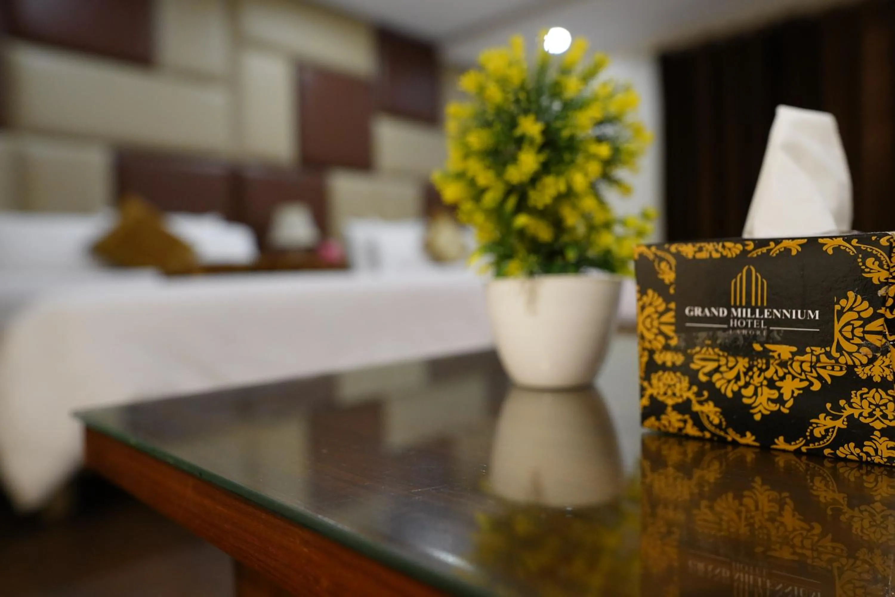 Bed in Grand Millennium Hotel