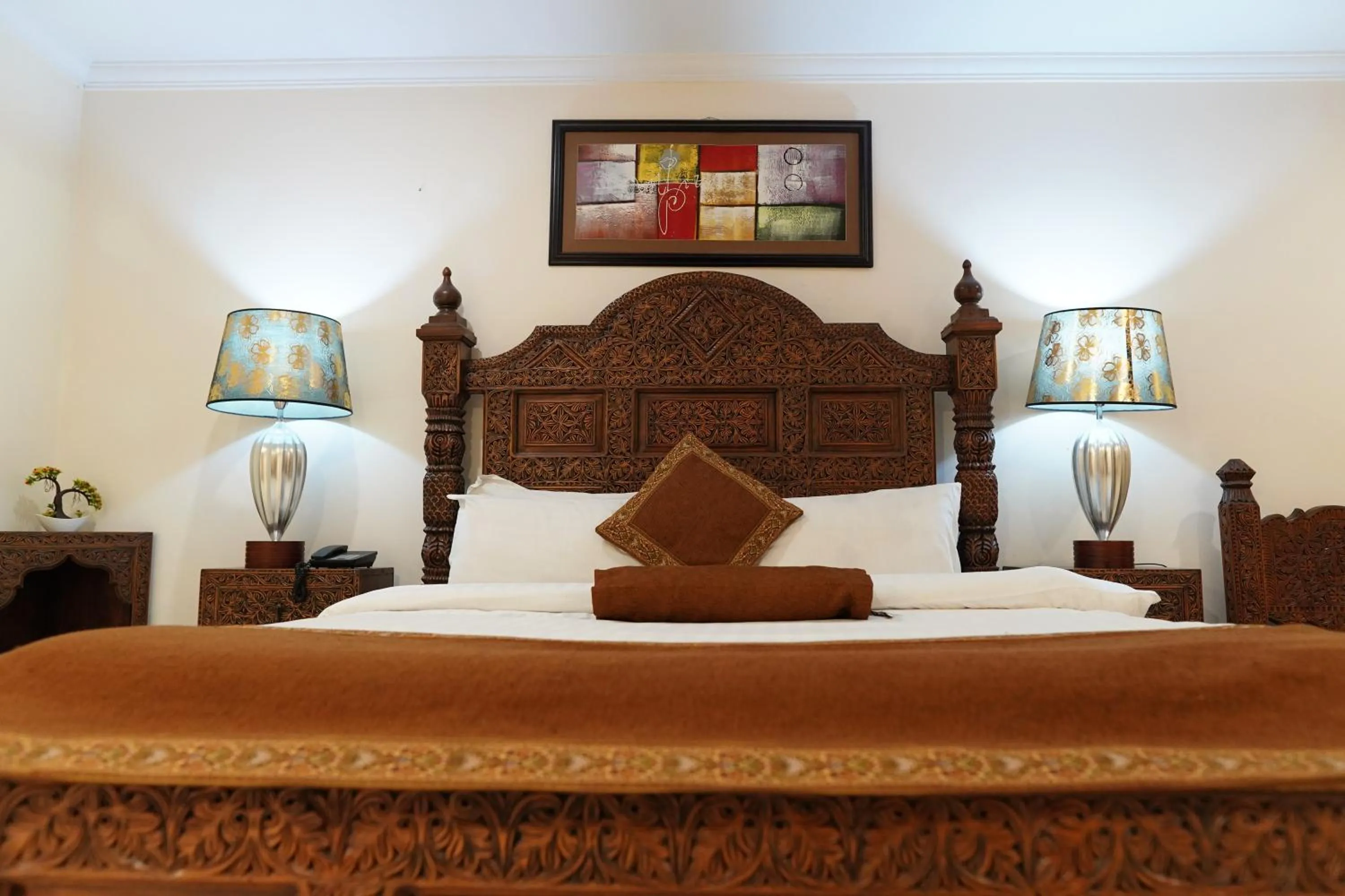 Bed in Grand Millennium Hotel