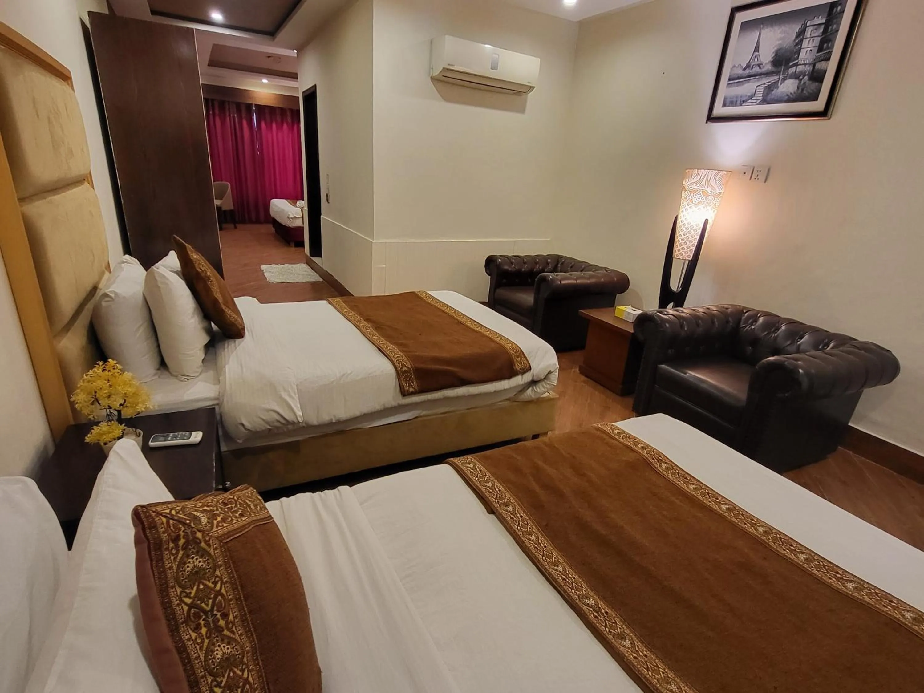 Bed in Grand Millennium Hotel