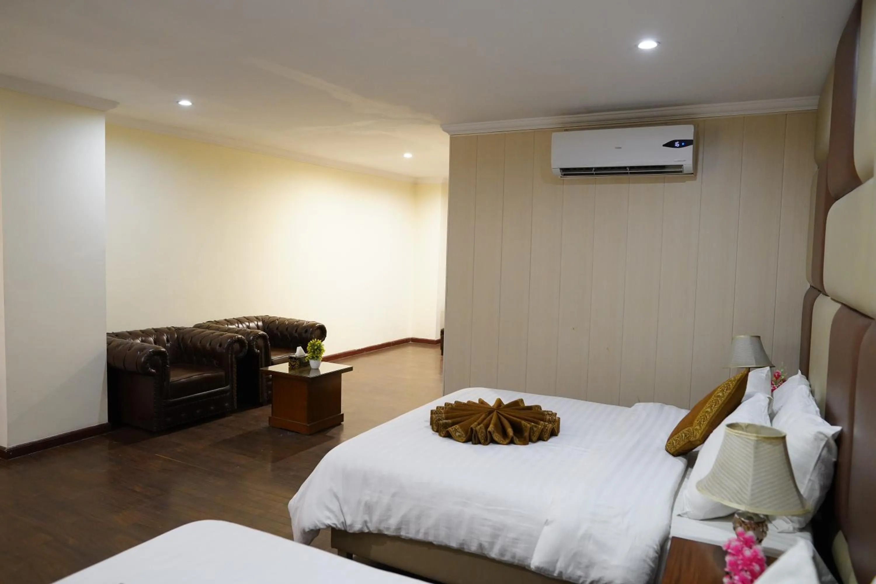 Bed in Grand Millennium Hotel