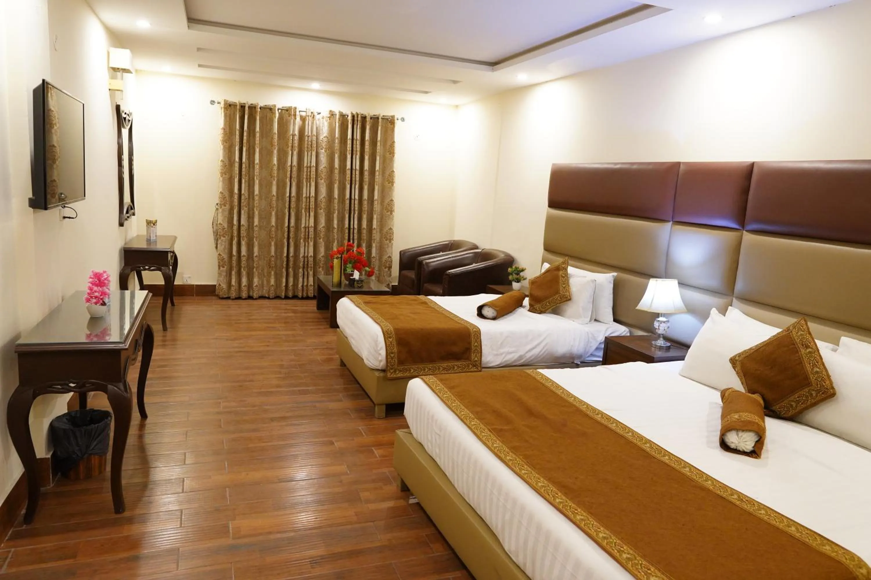 Bed in Grand Millennium Hotel