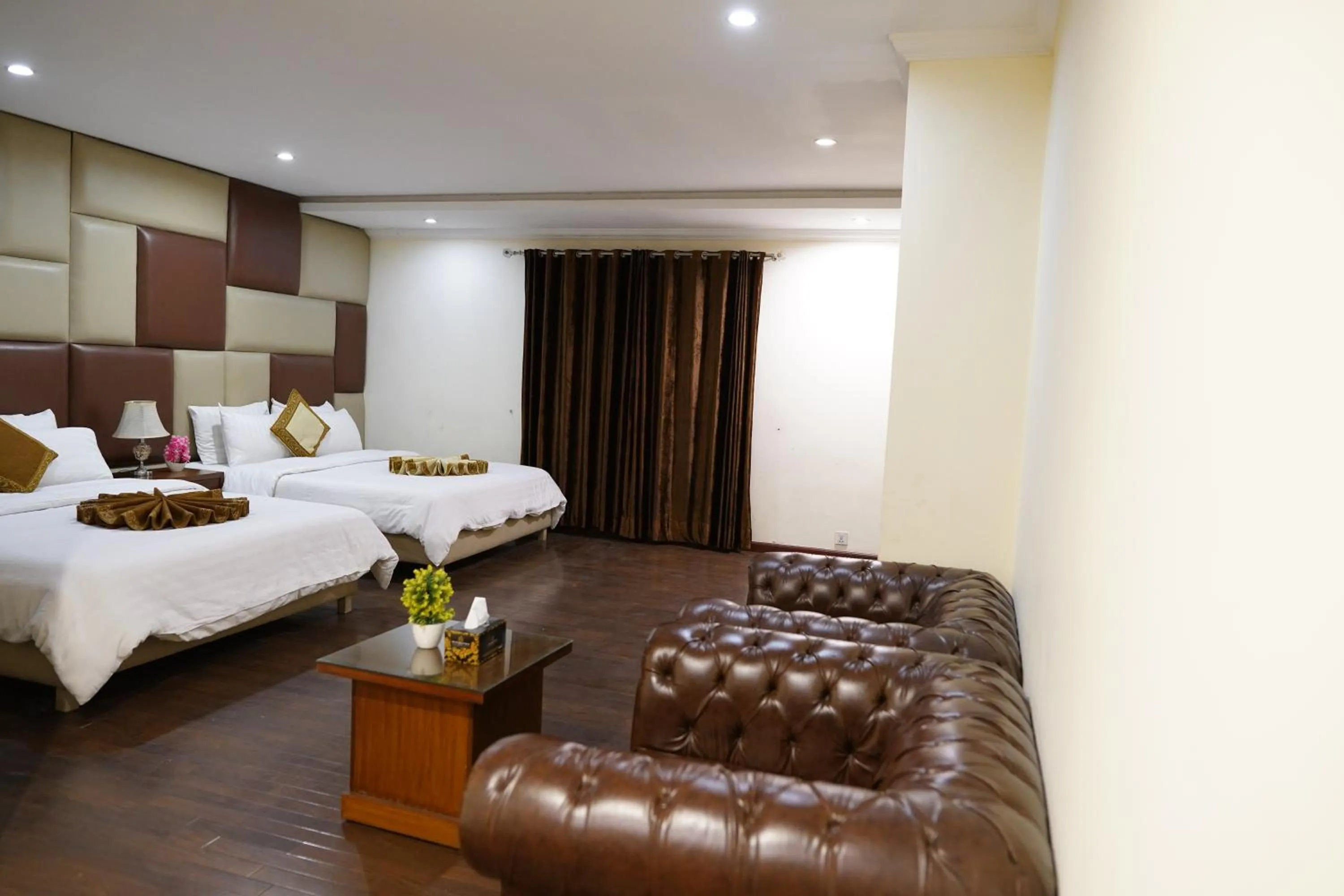 Bed in Grand Millennium Hotel