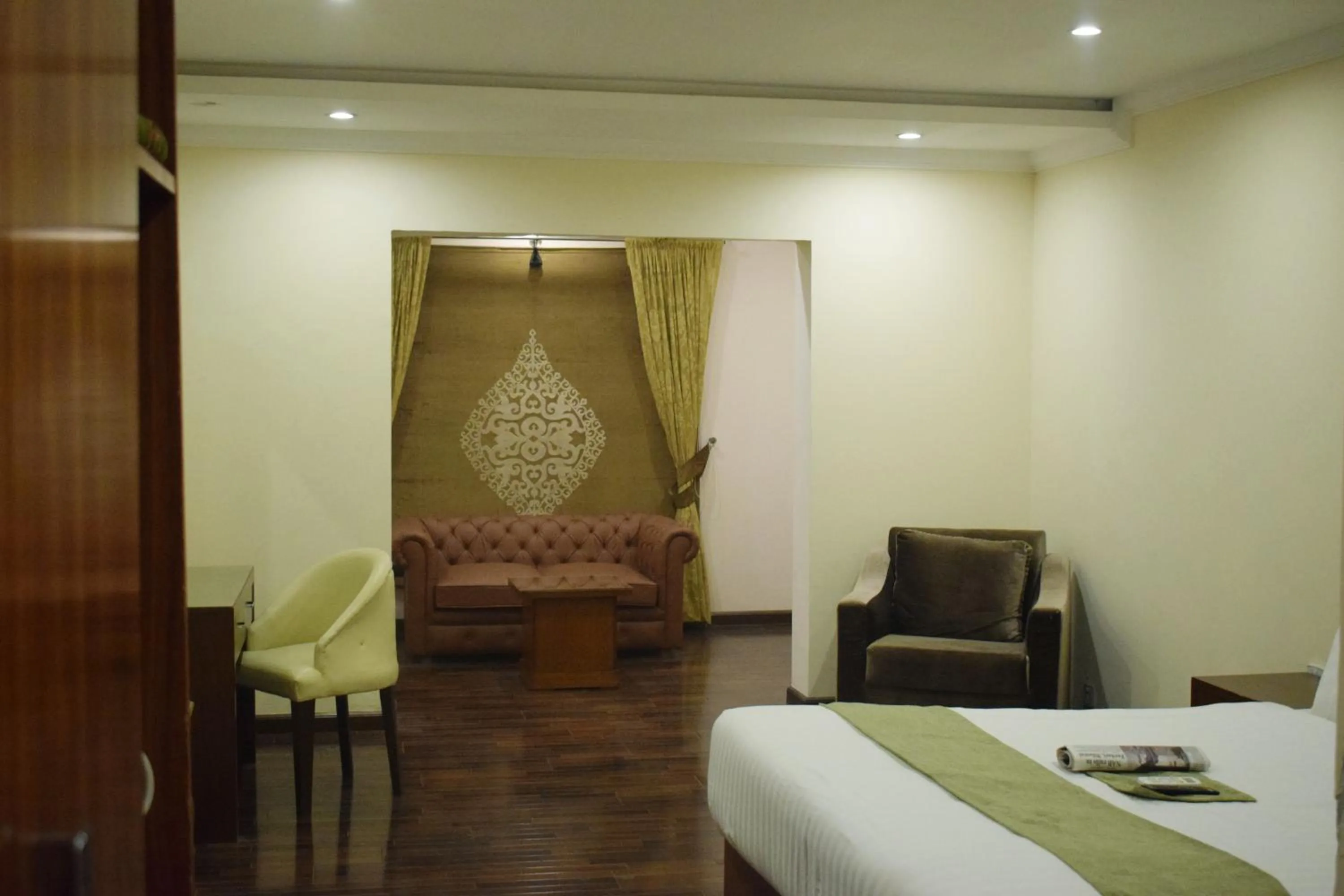 Photo of the whole room, Bed in Grand Millennium Hotel