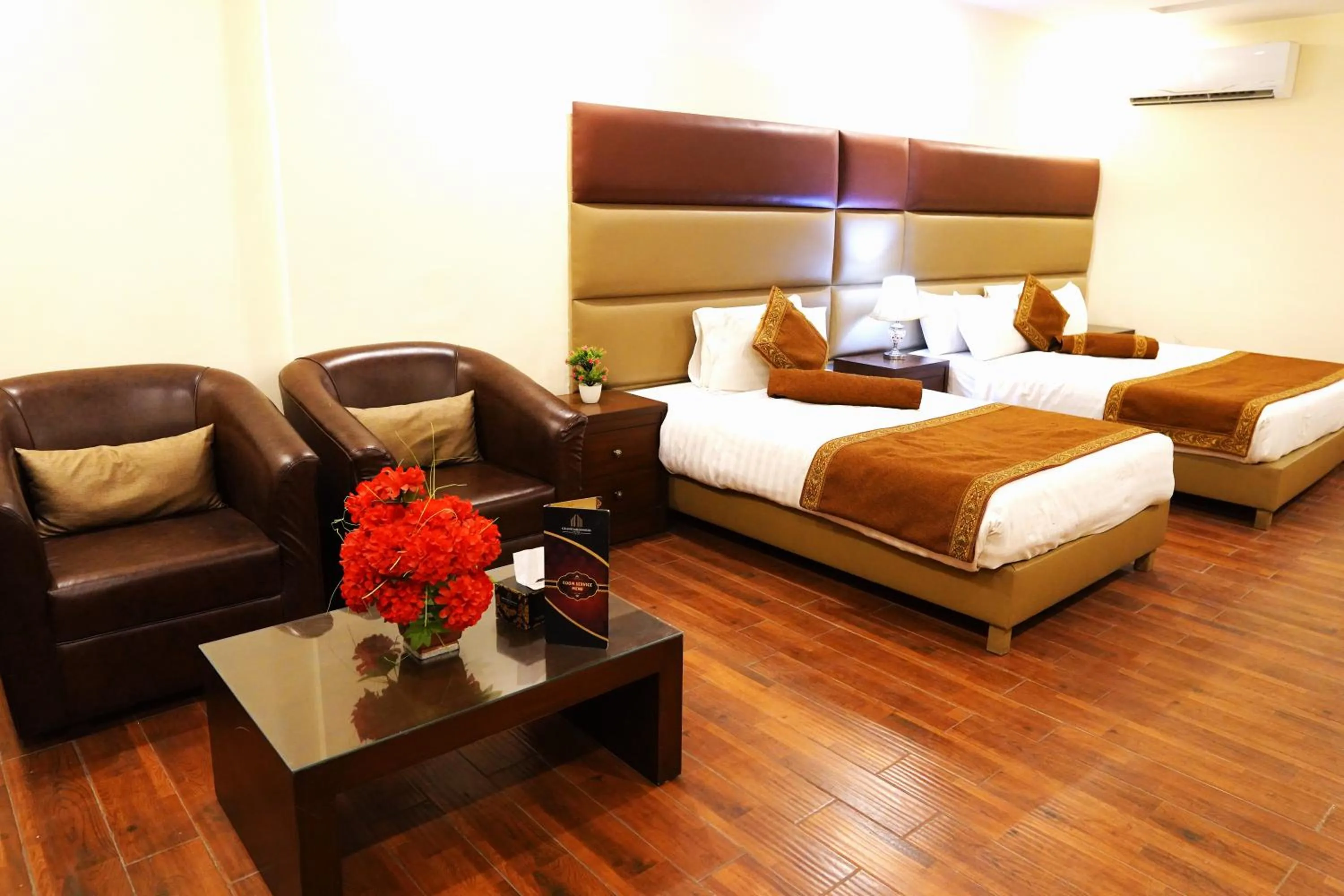 Bed in Grand Millennium Hotel