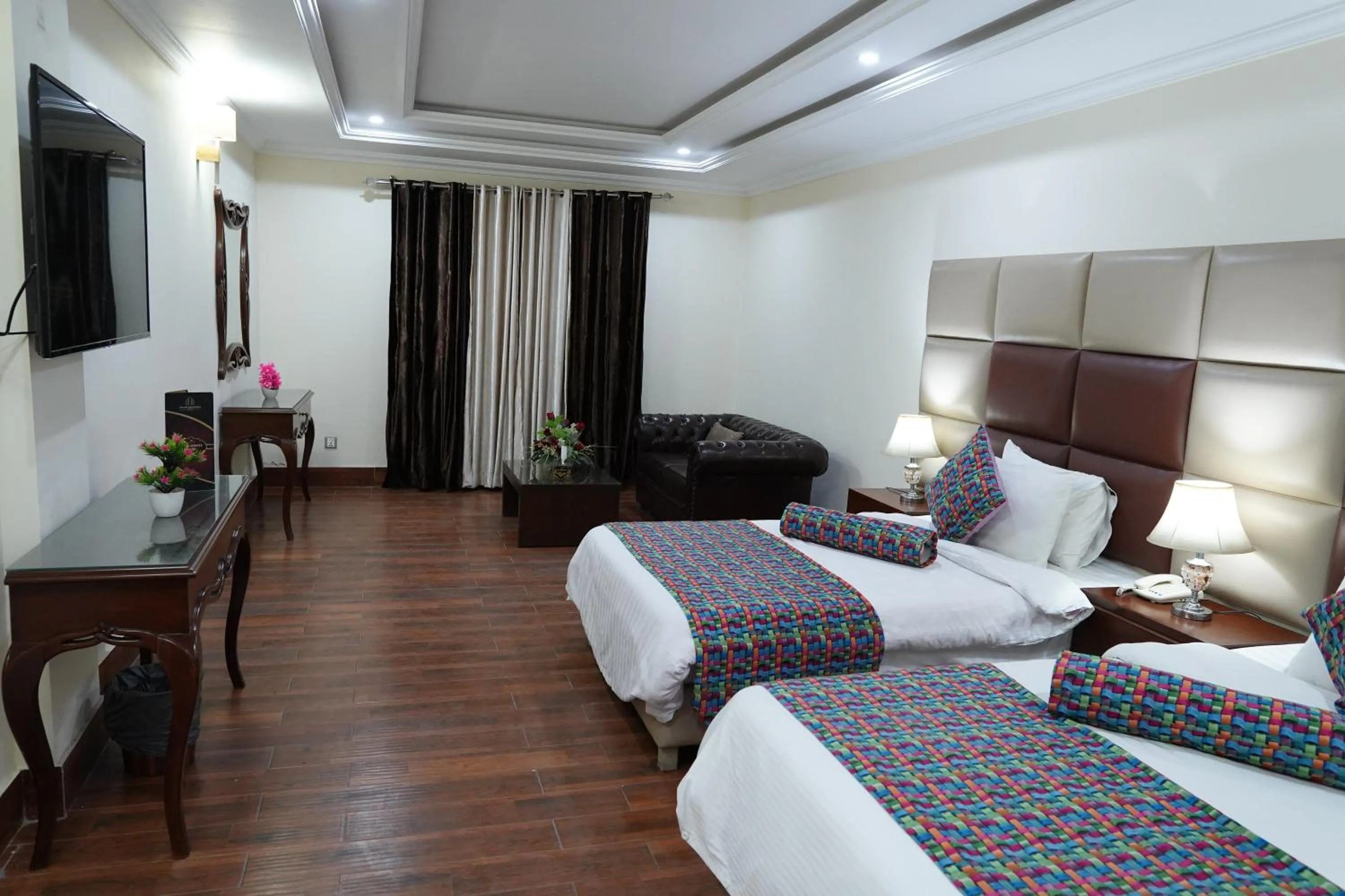 Bed in Grand Millennium Hotel