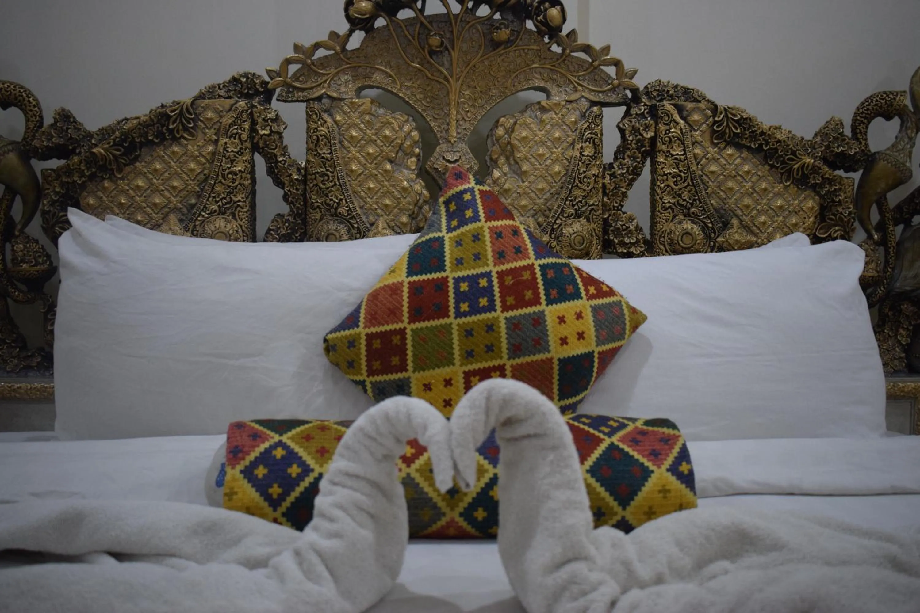 Bed in Grand Millennium Hotel