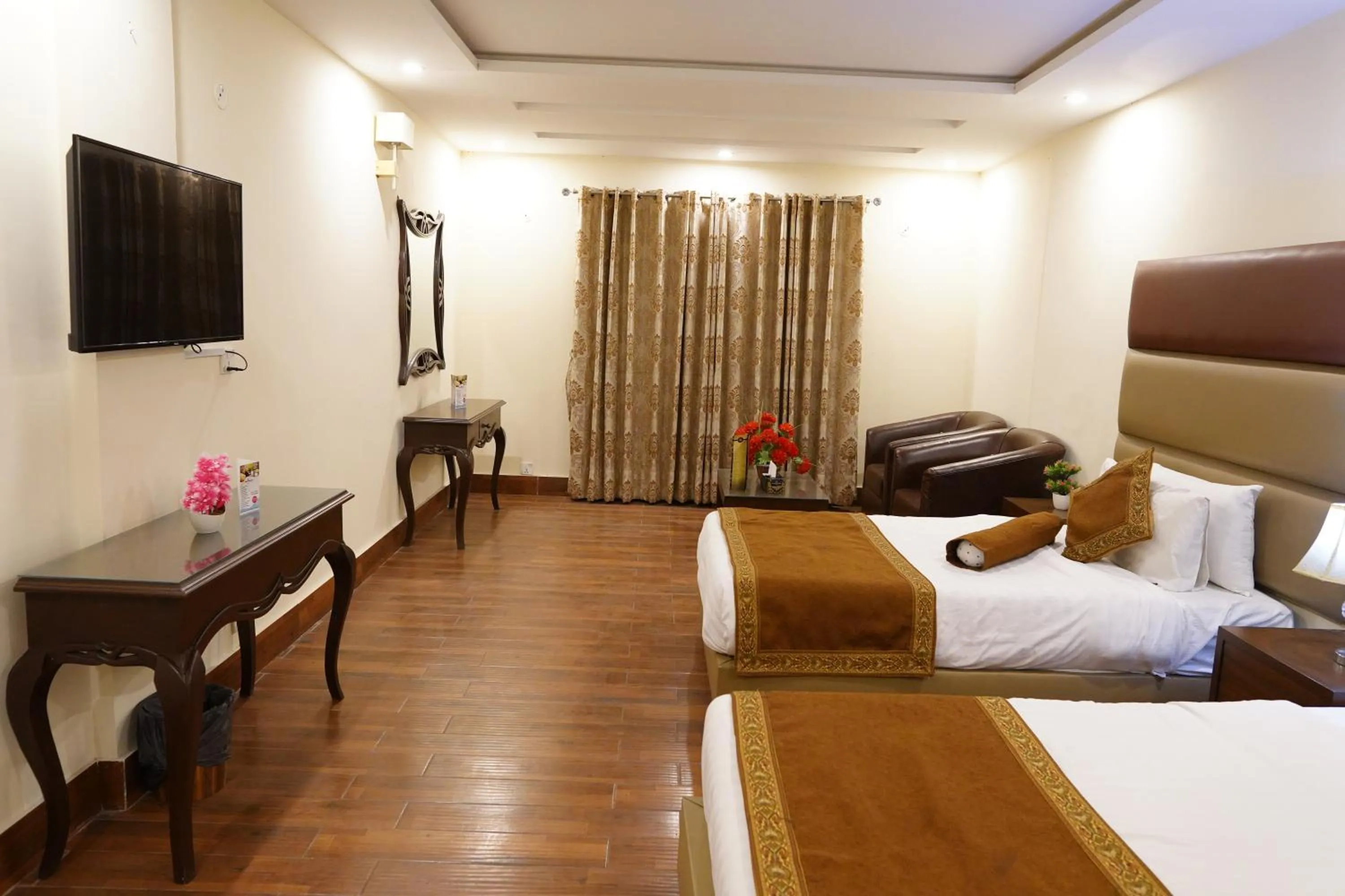 Bed in Grand Millennium Hotel