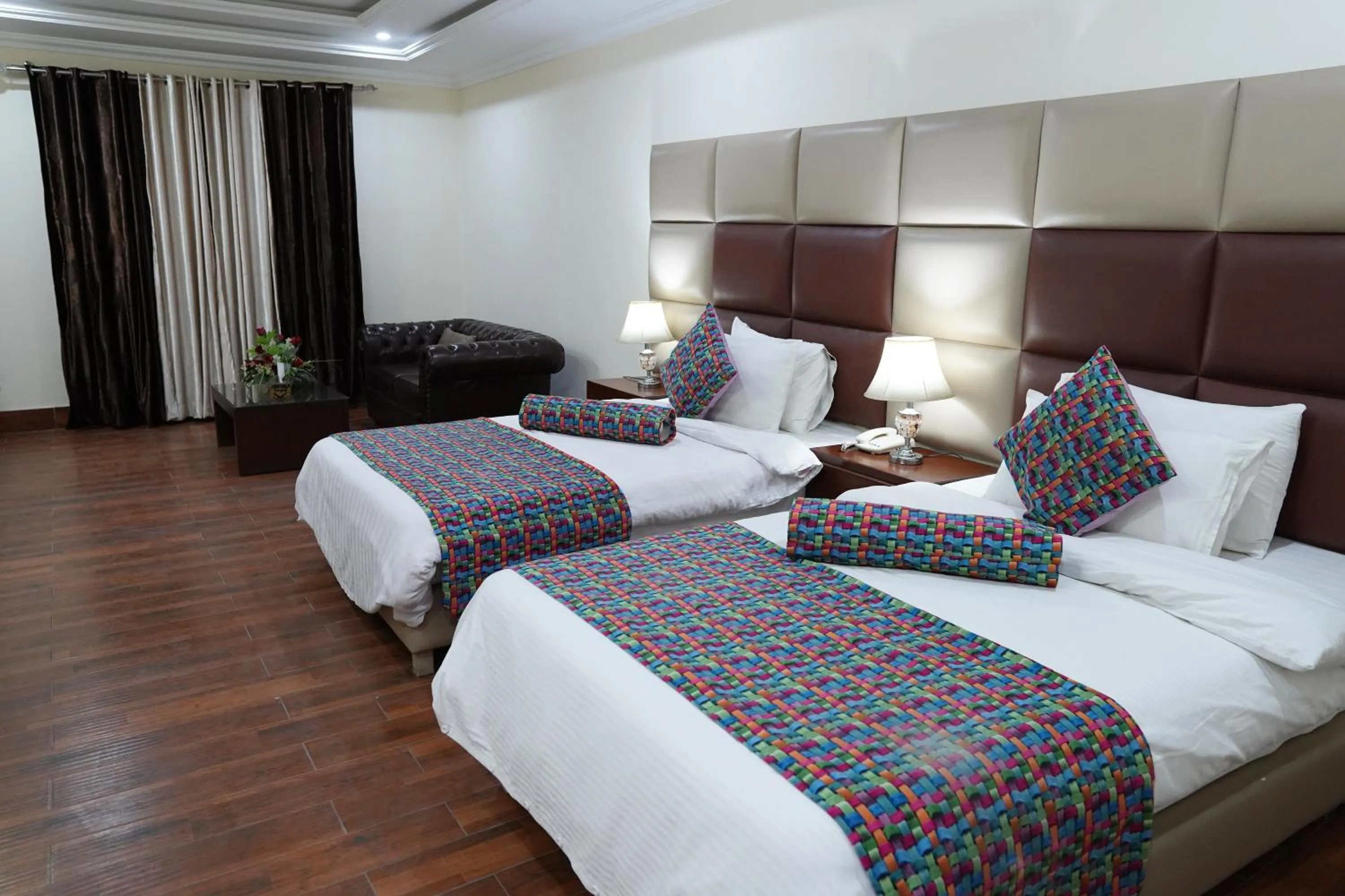 Bed in Grand Millennium Hotel