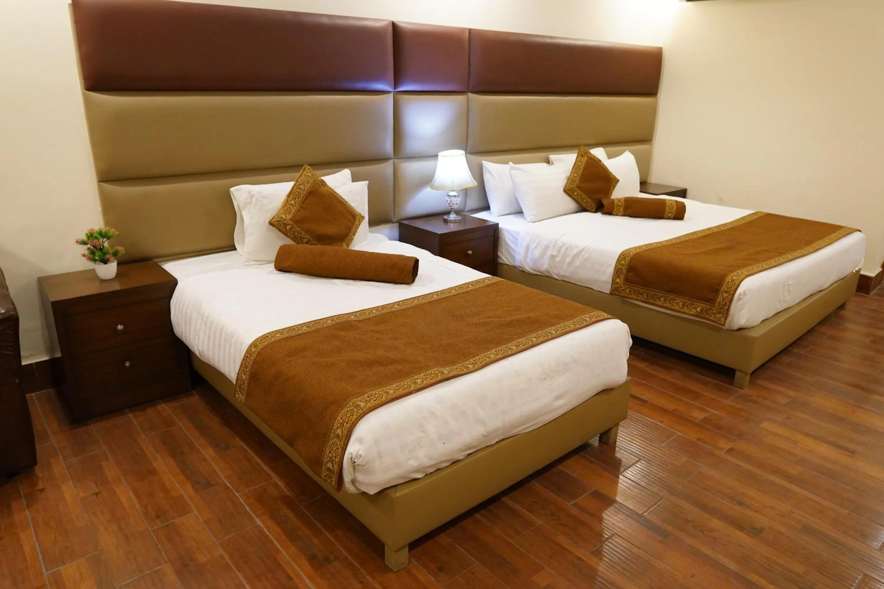 Bed in Grand Millennium Hotel