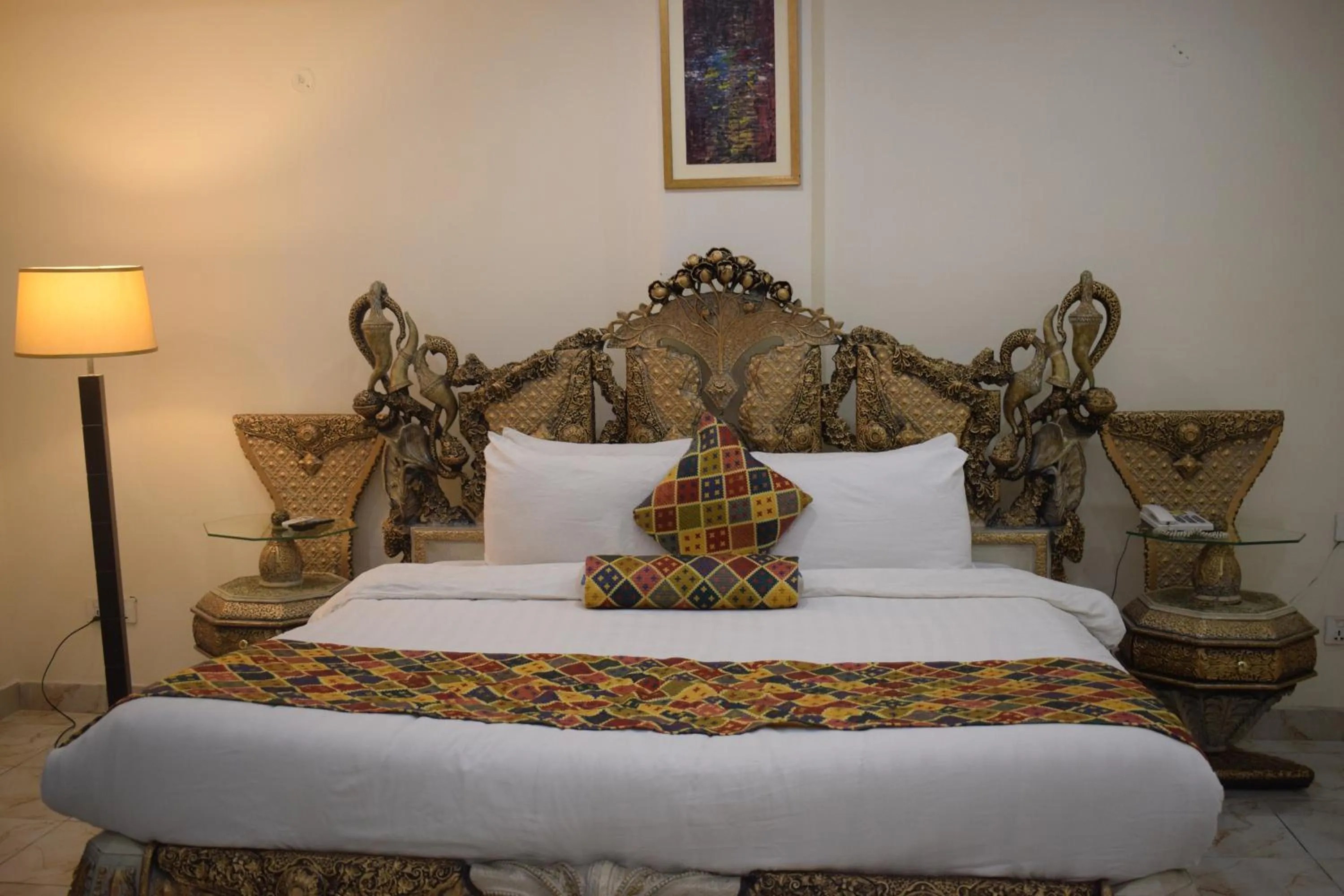 Bed in Grand Millennium Hotel