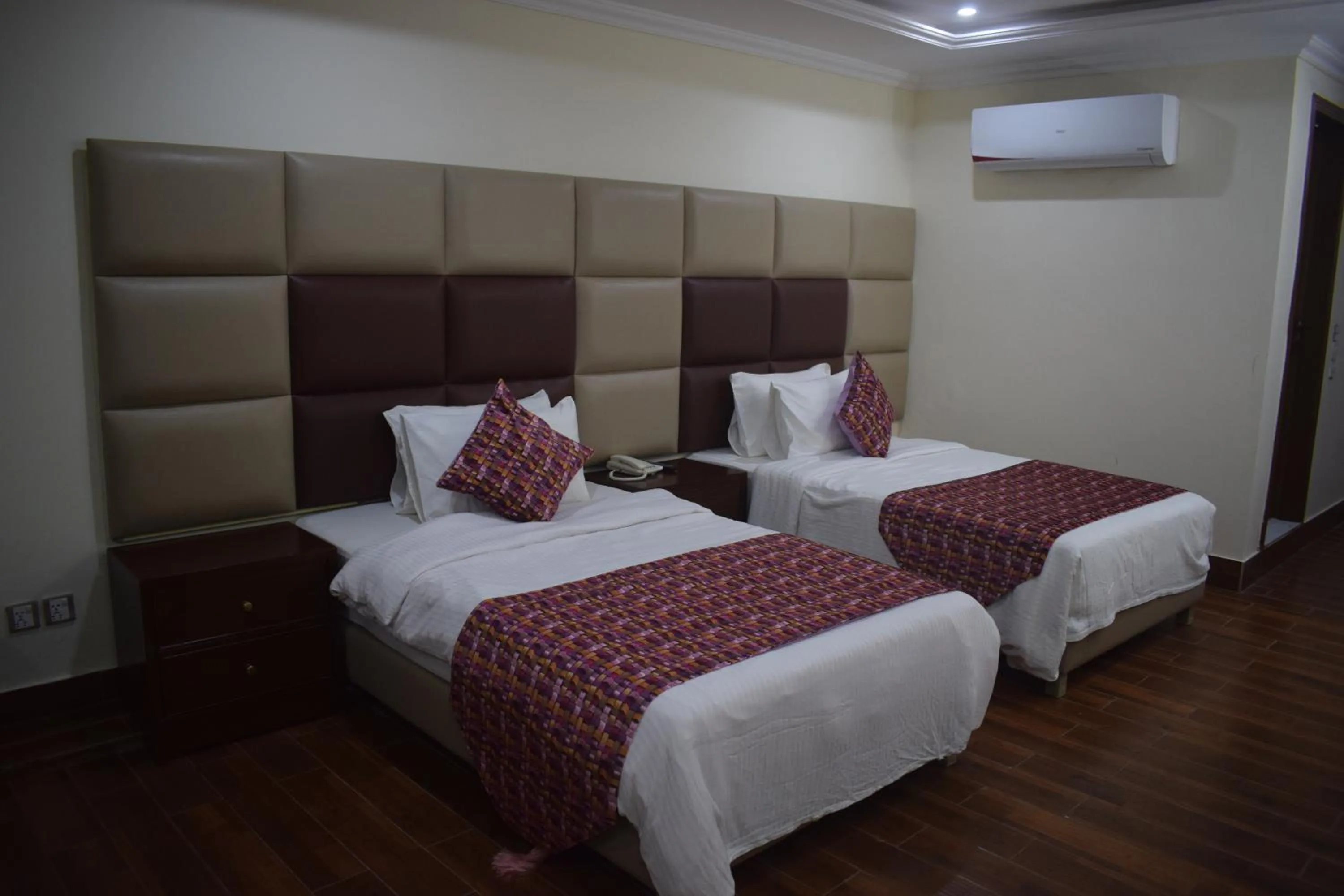 Bed in Grand Millennium Hotel