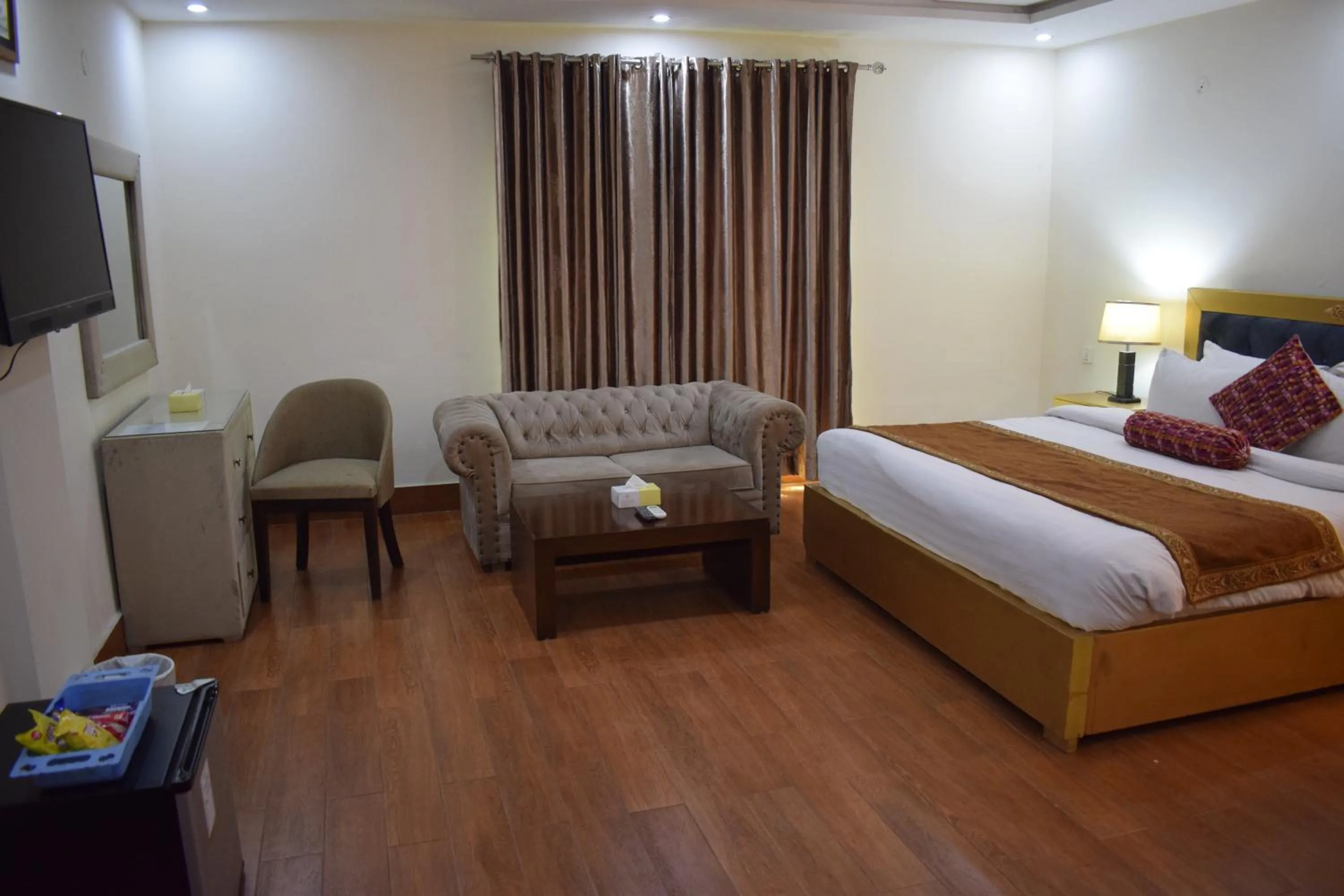 Bed in Grand Millennium Hotel