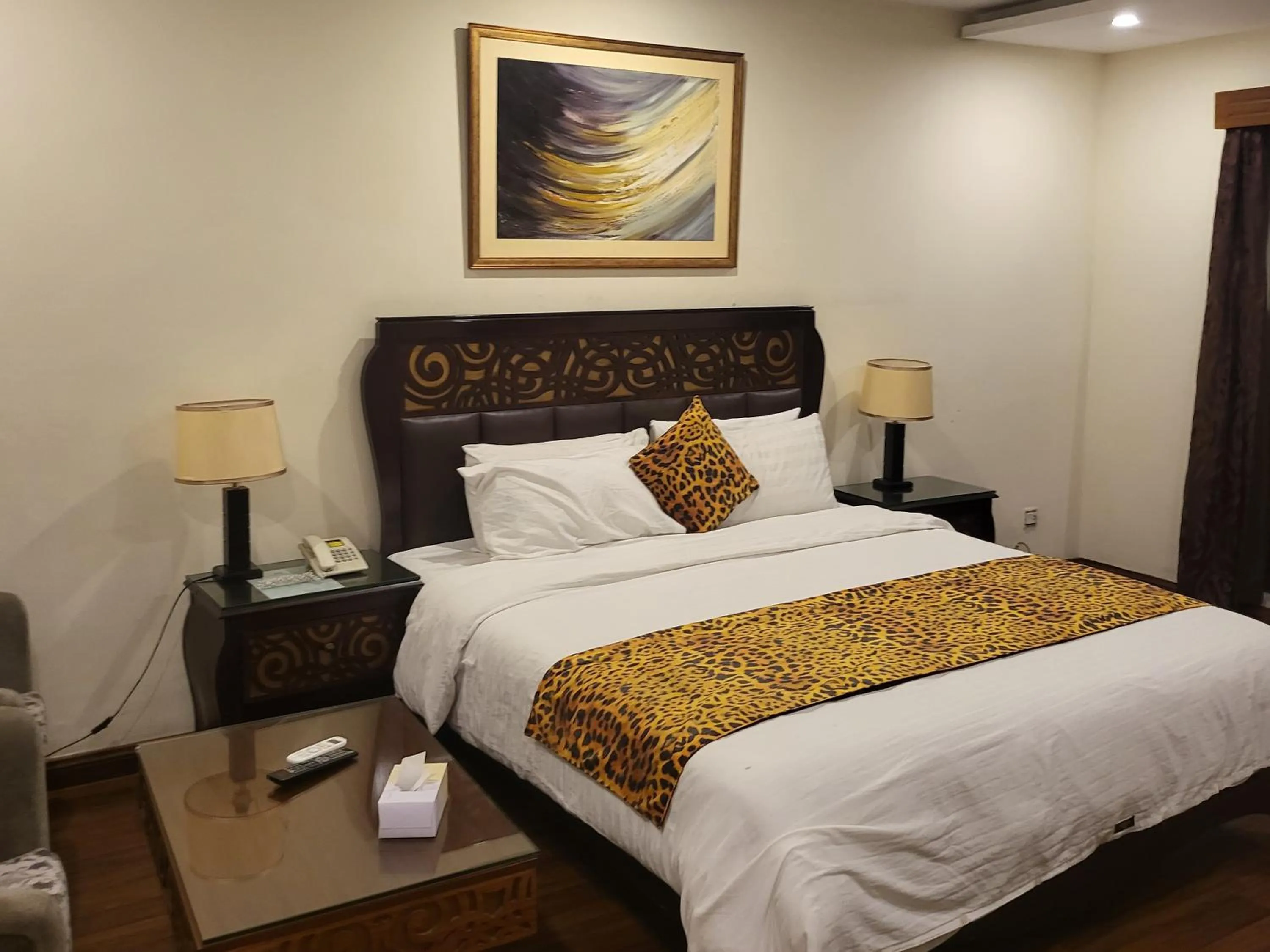 Bed in Grand Millennium Hotel