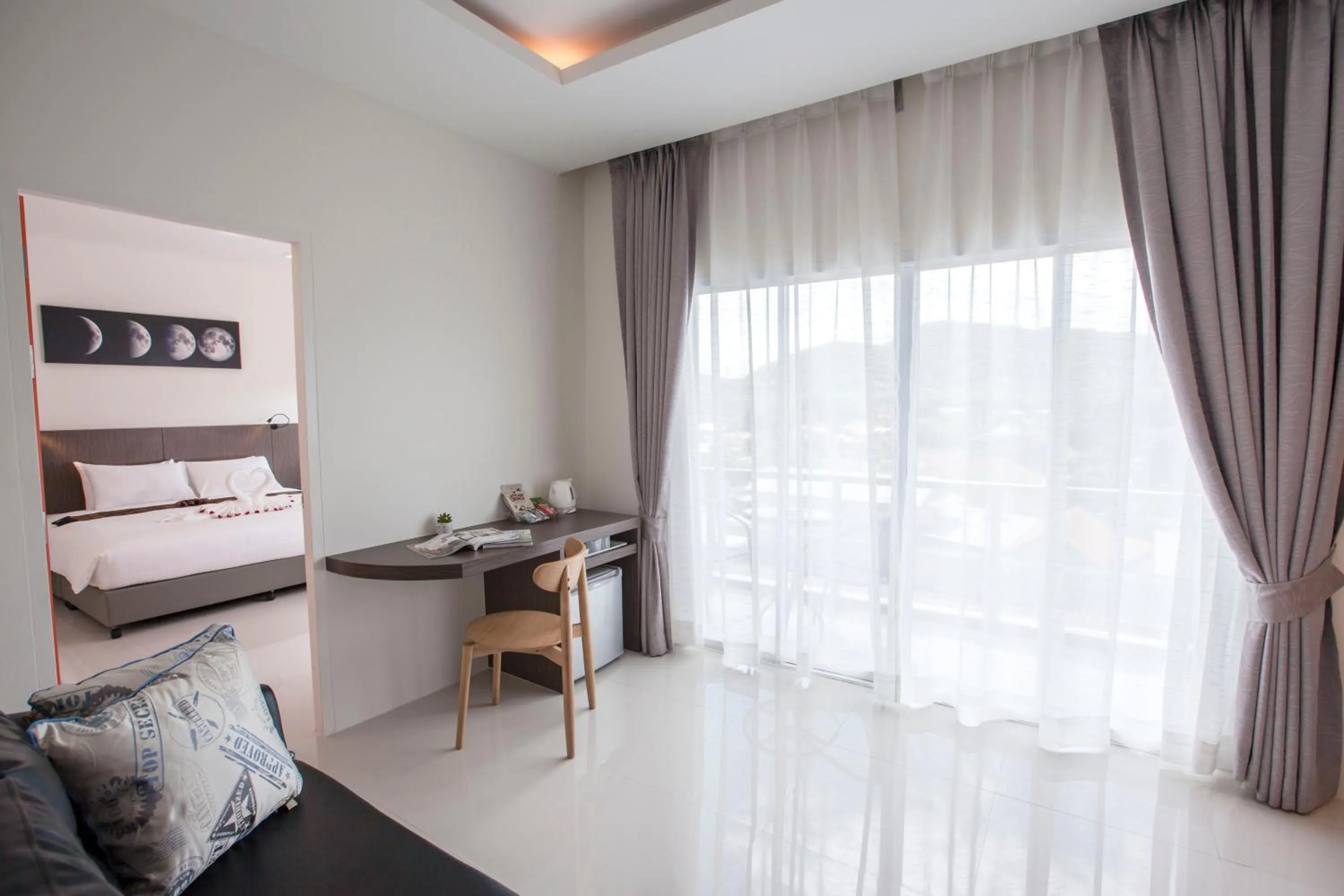 Seating area, Bed in The Elysium Residence - SHA Extra Plus