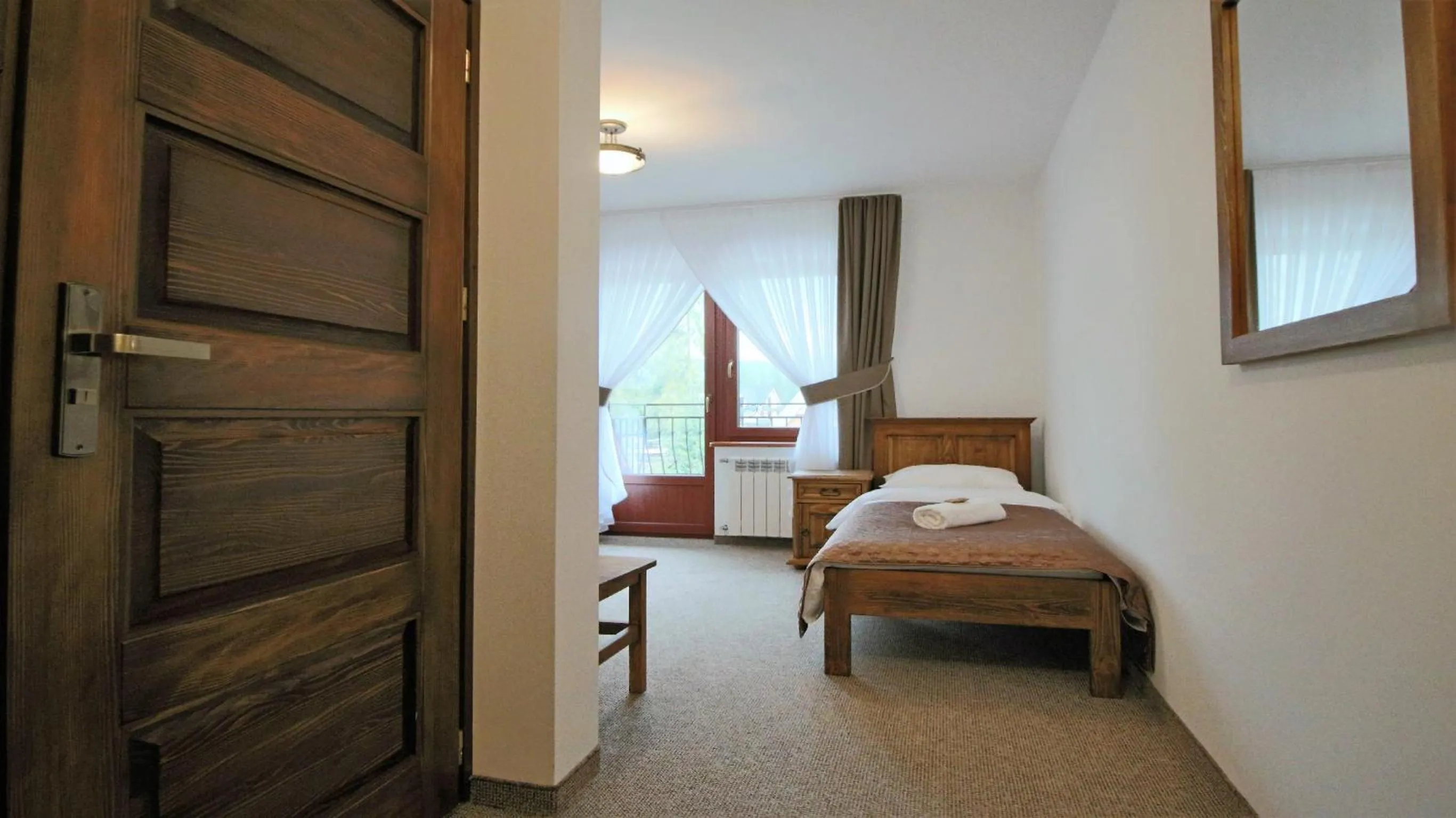 Photo of the whole room, Bed in Willa Lichajówka