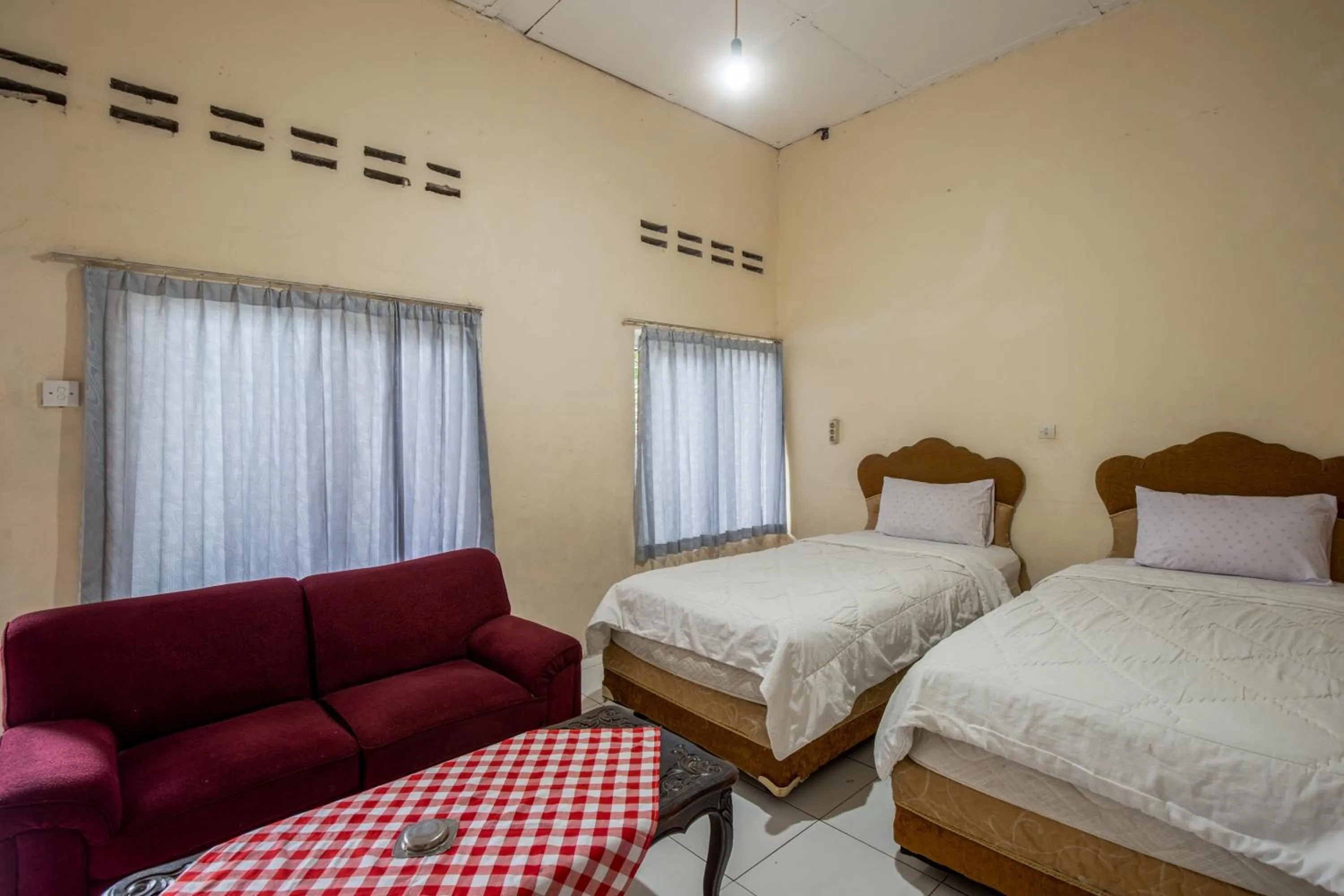 Photo of the whole room, Bed in Hotel Jogja Bukittinggi