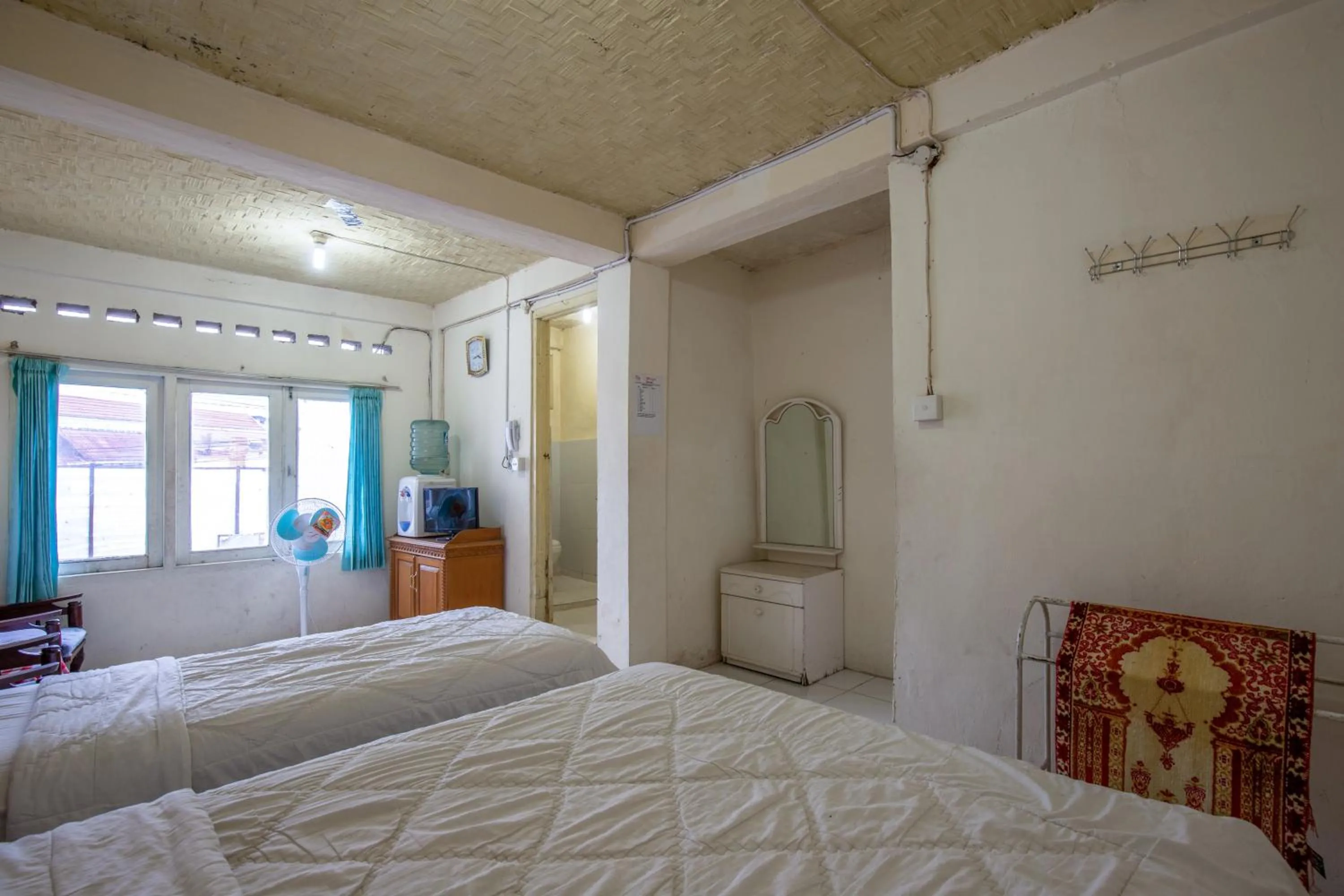 Photo of the whole room, Bed in Hotel Jogja Bukittinggi